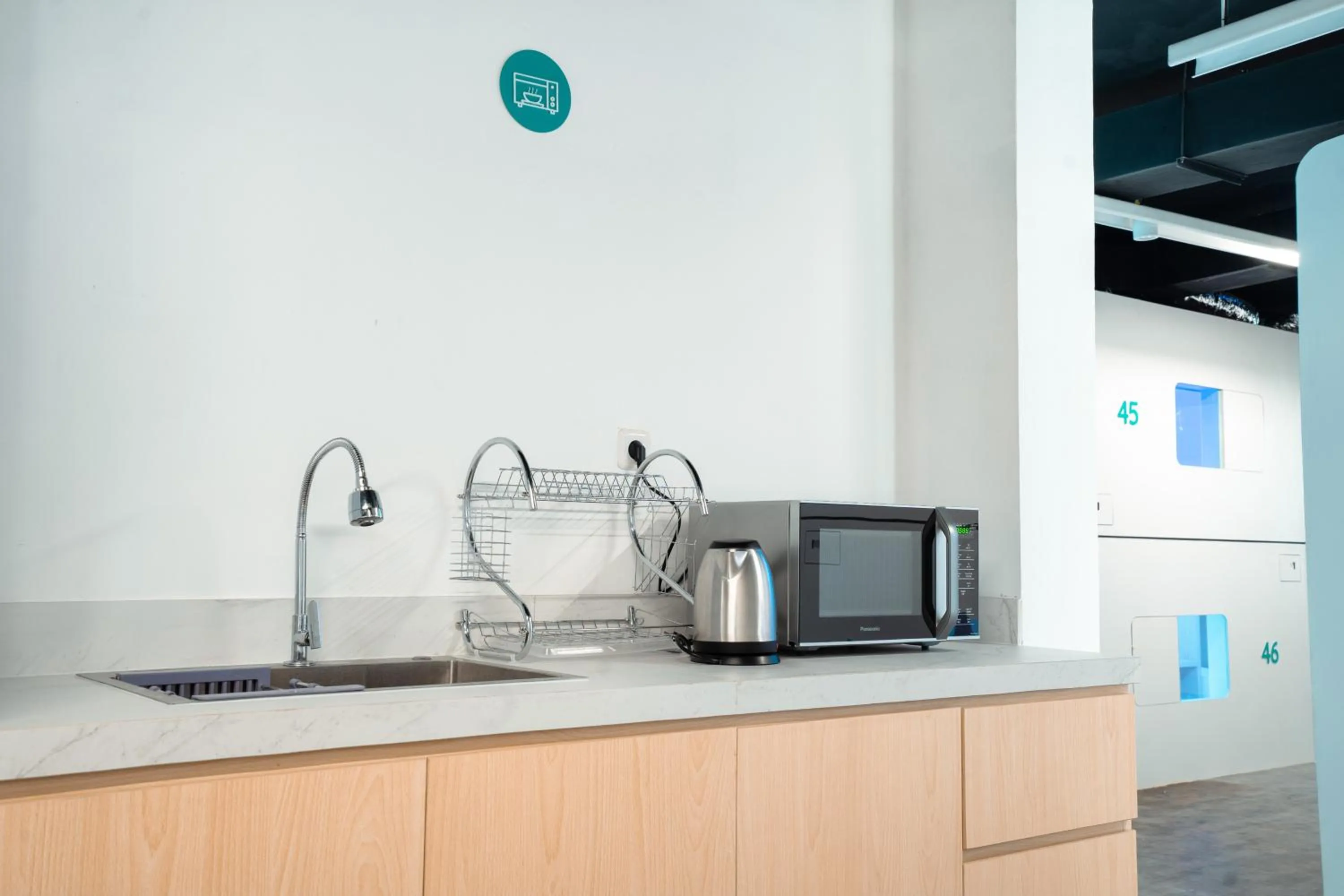 Communal kitchen in Bobopod Kebayoran Baru, Jakarta