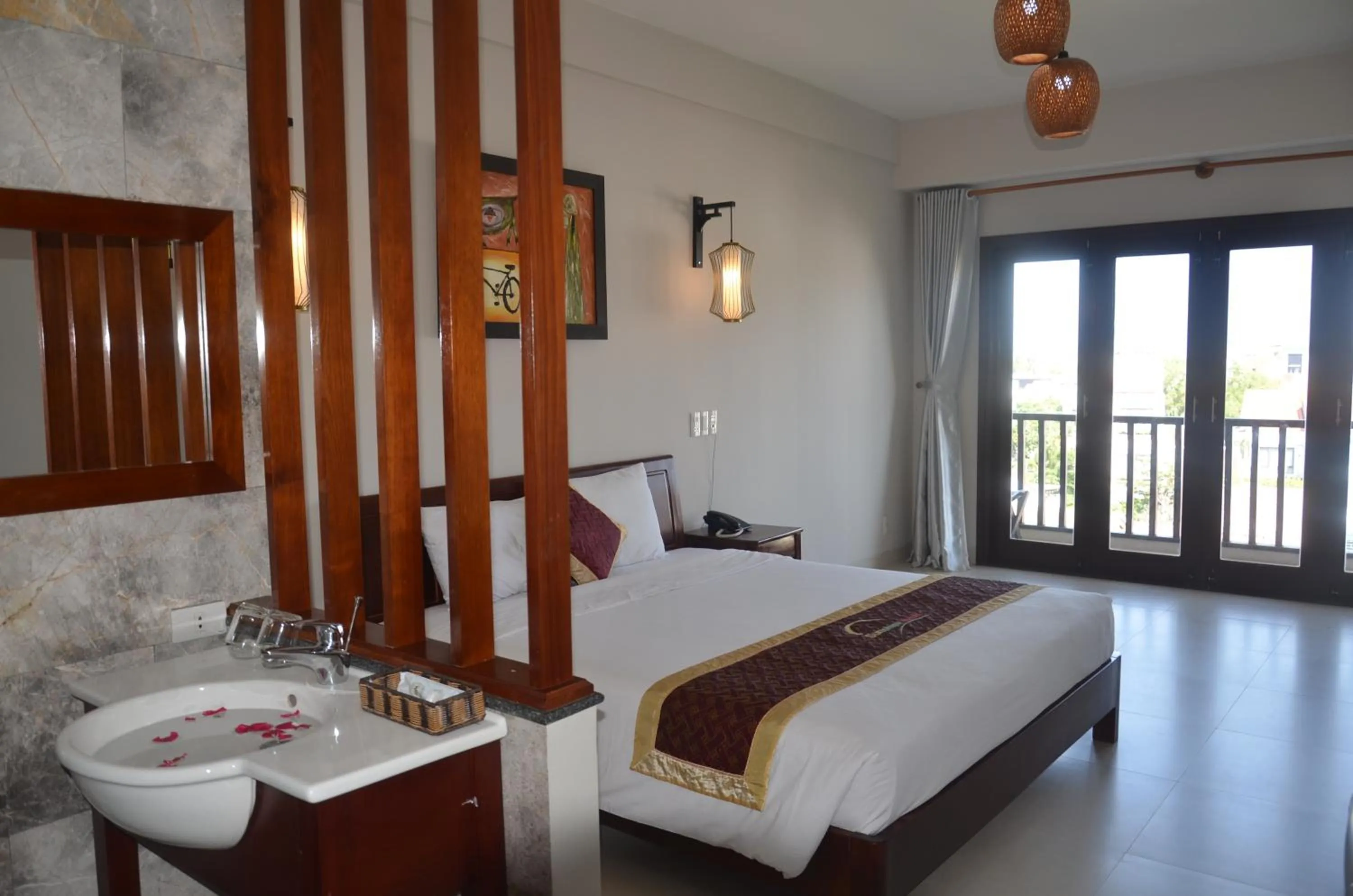 Bed in Sunshine Hoian Hotel