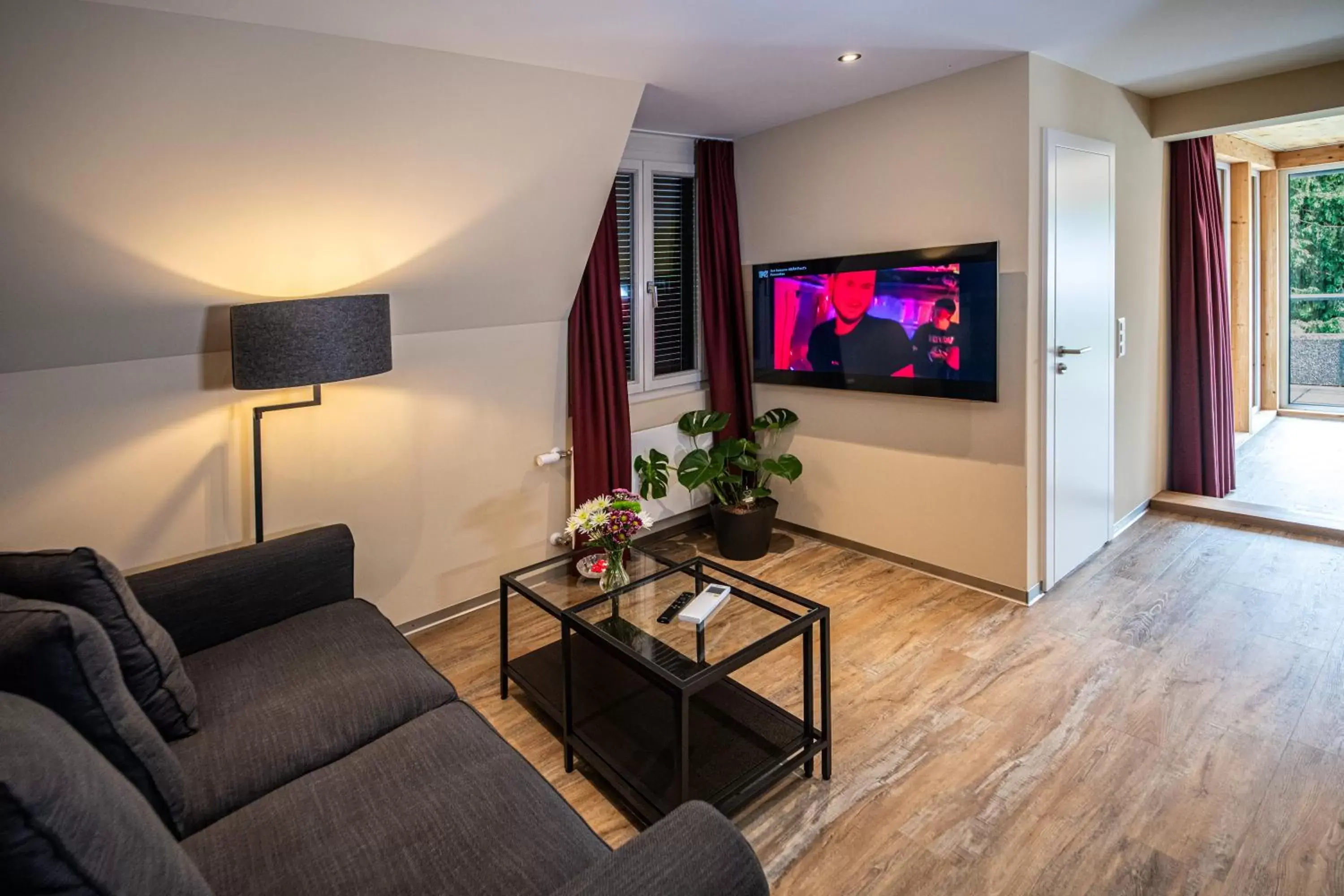 TV and multimedia, Seating Area in Swiss Inn & Apartments