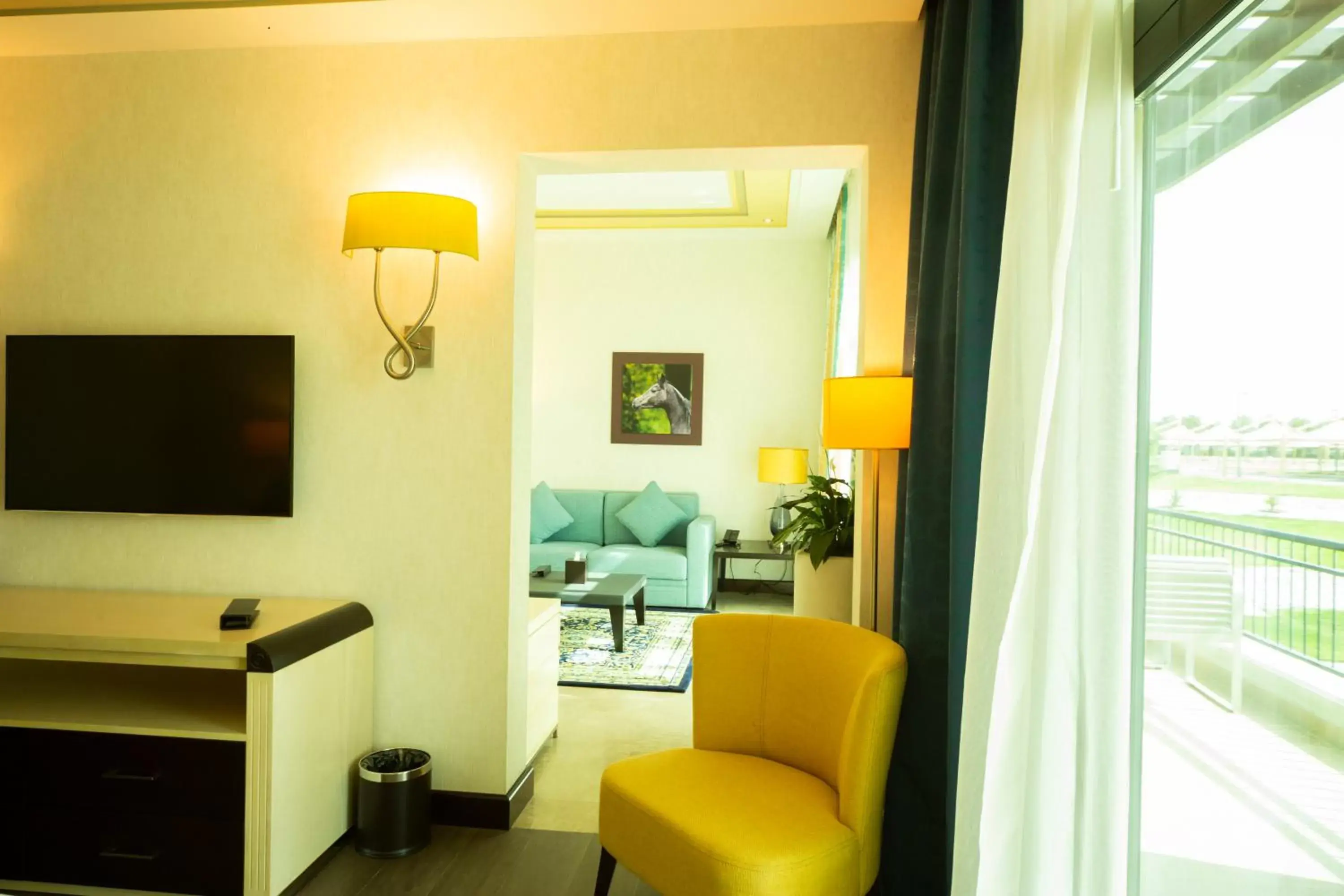 Communal lounge/ TV room, TV/Entertainment Center in Retaj Salwa Resort & Spa
