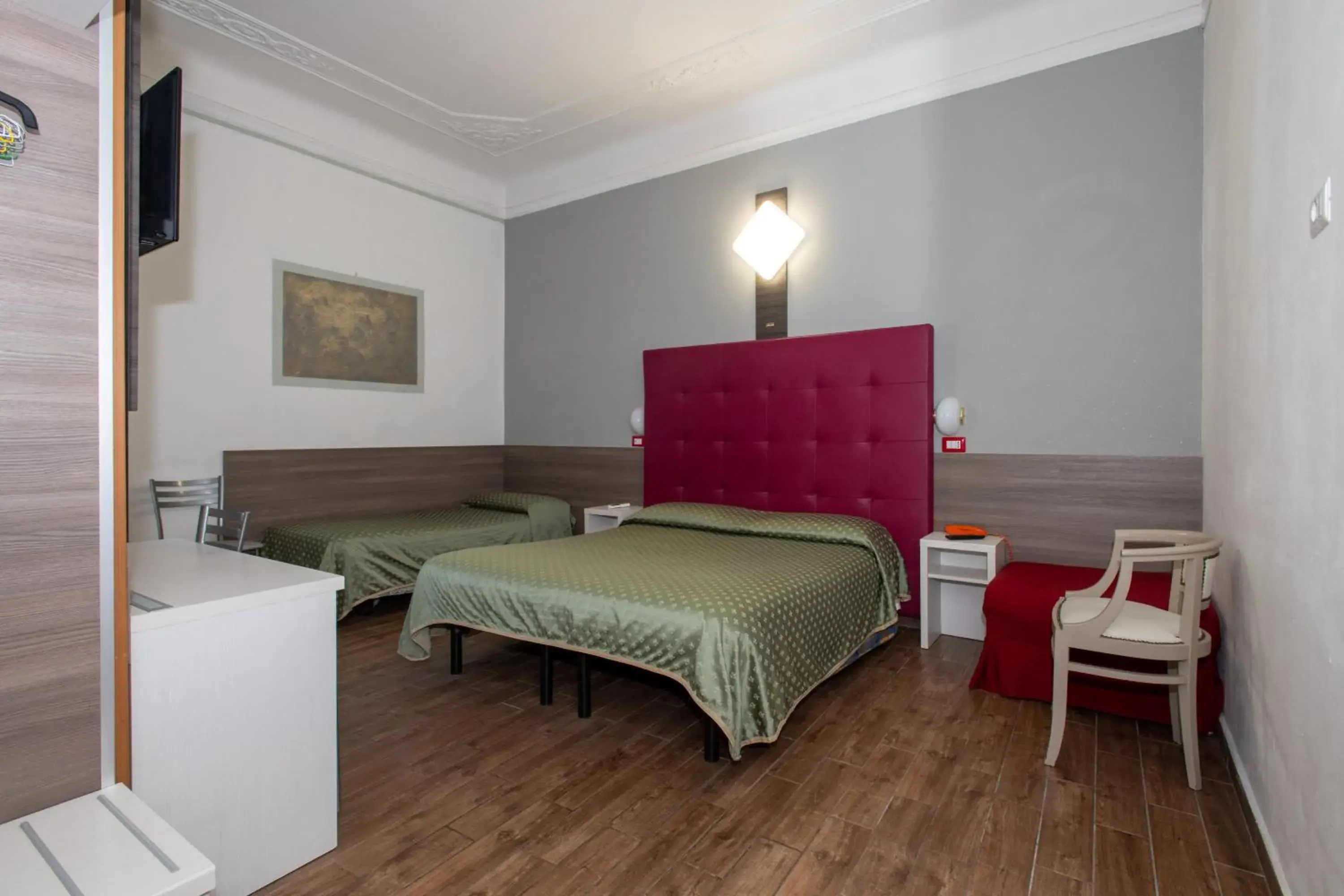 Bed in Hotel Piola