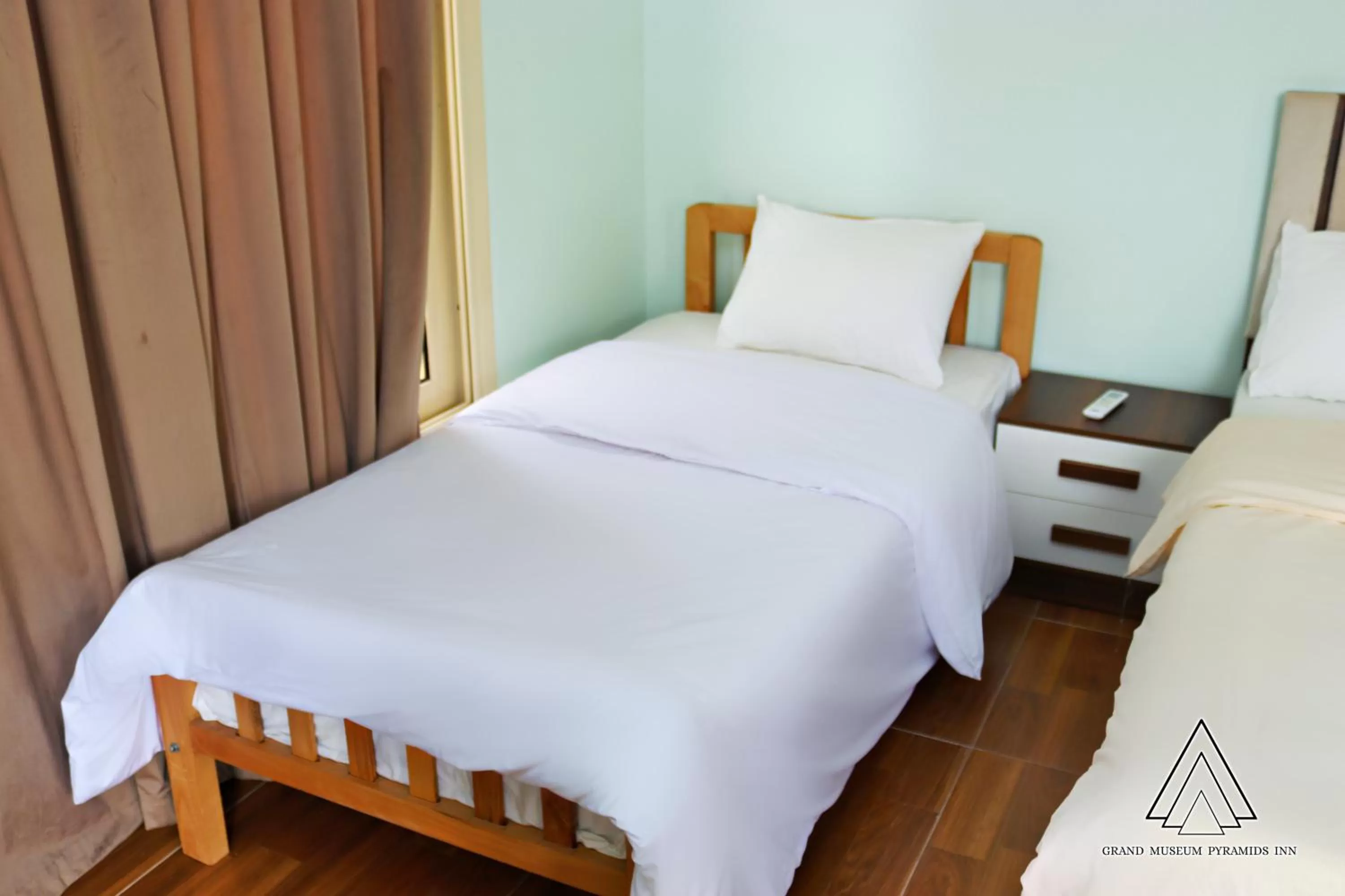 Bed in Grand Museum Pyramids Inn