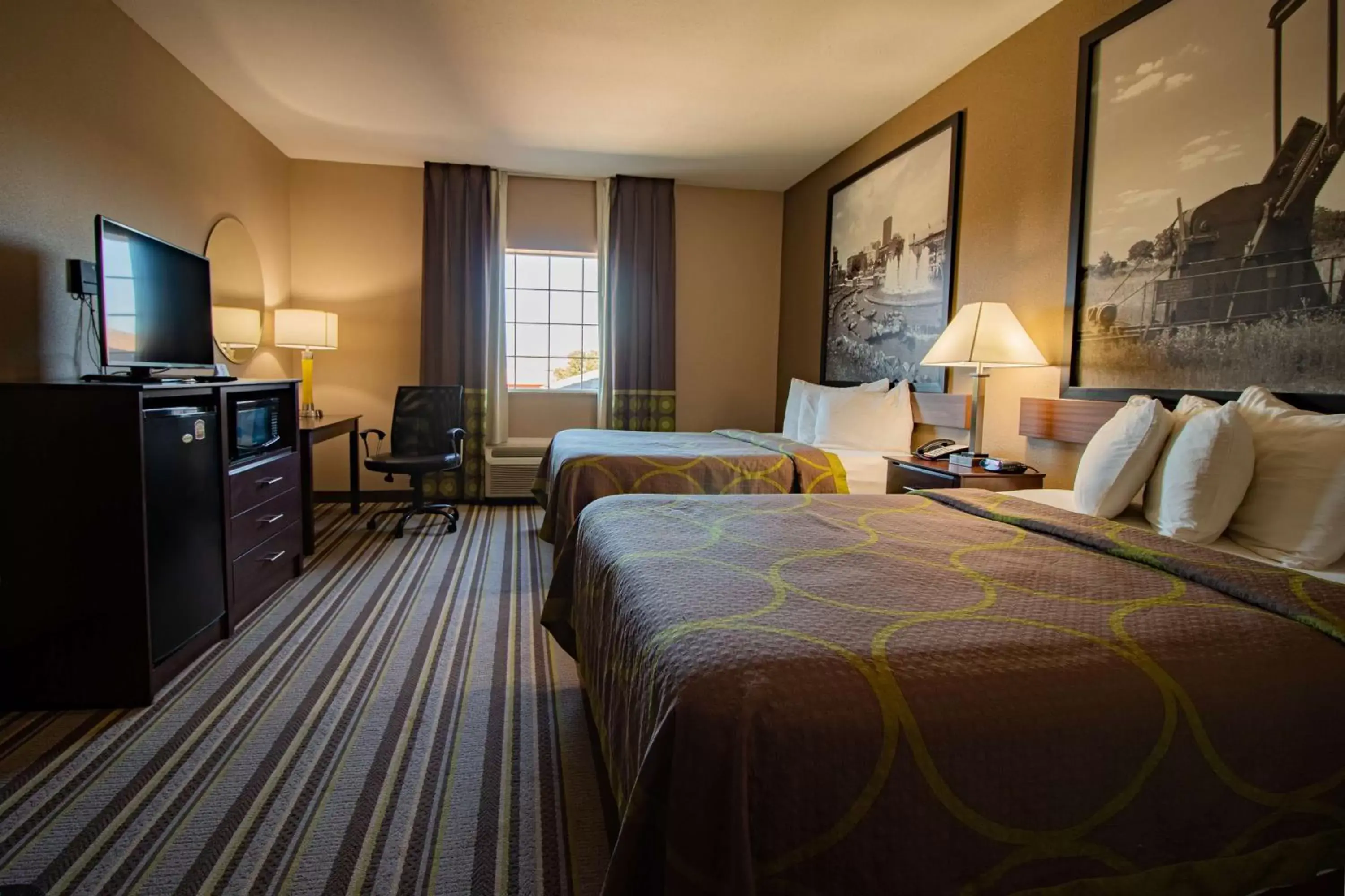 Bedroom in SureStay Plus Hotel by Best Western Owasso Tulsa North