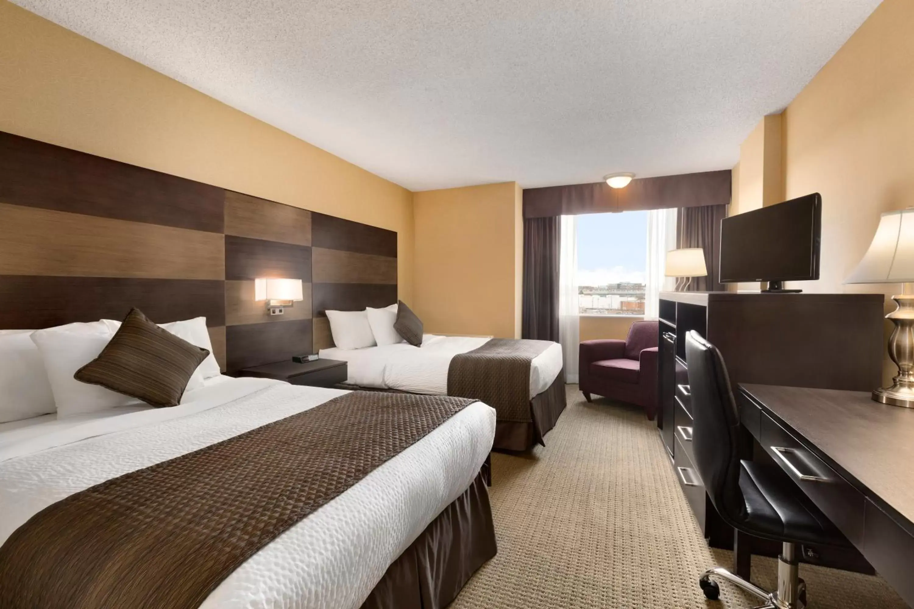 Bedroom in Days Inn by Wyndham Calgary South