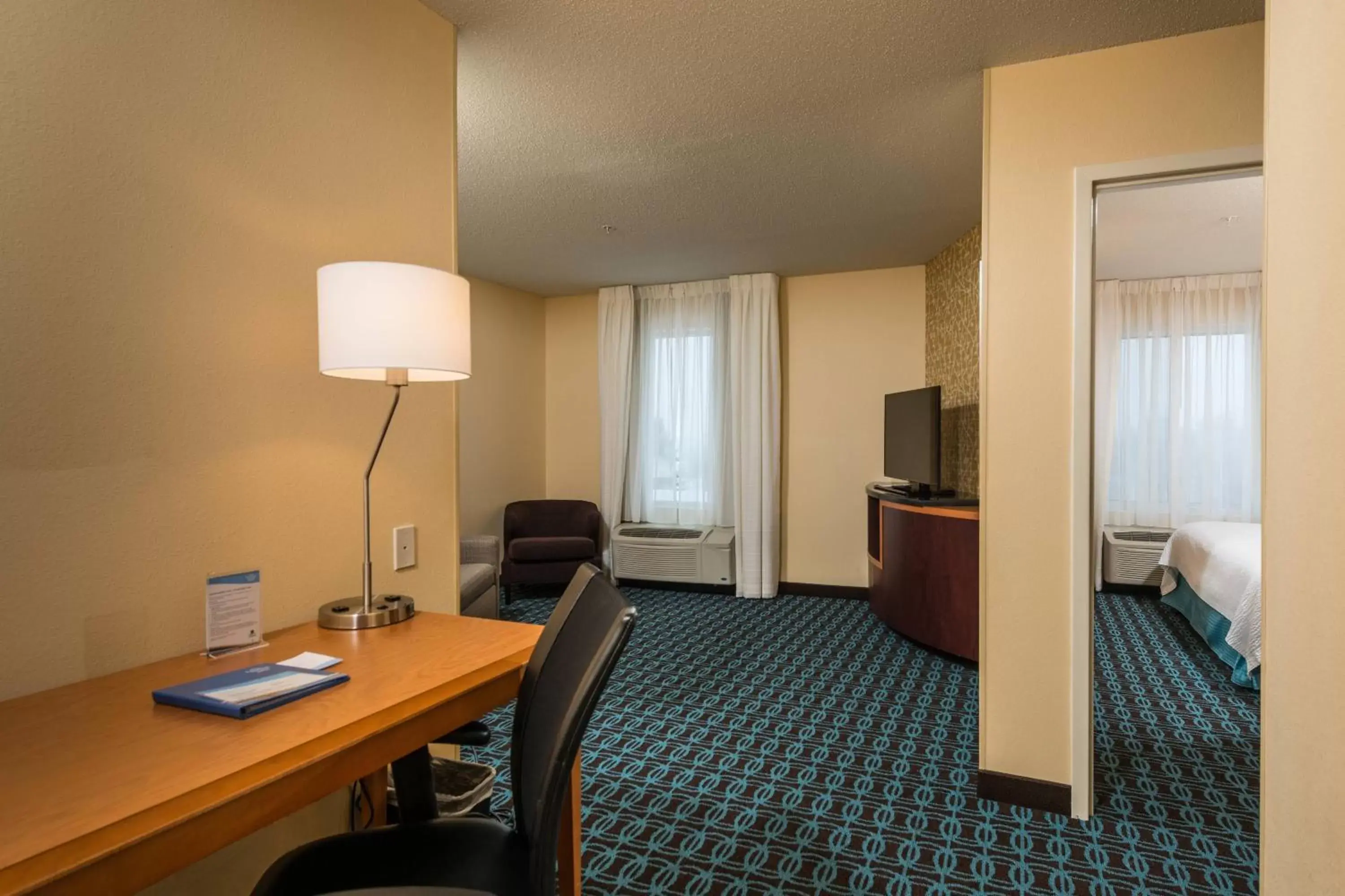 Photo of the whole room, TV/Entertainment Center in Fairfield Inn and Suites by Marriott Augusta