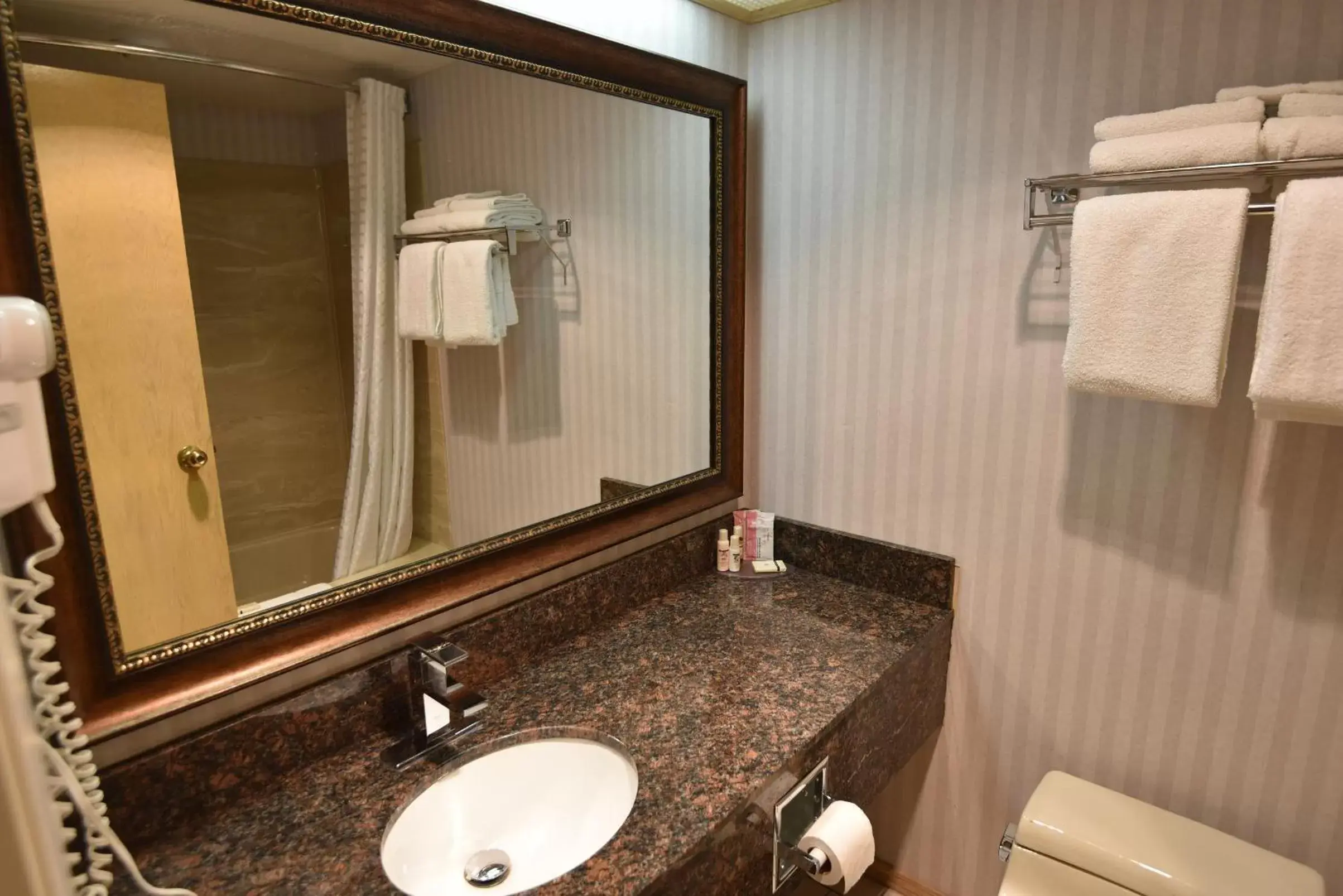 Bathroom in Travelodge by Wyndham Lloydminster