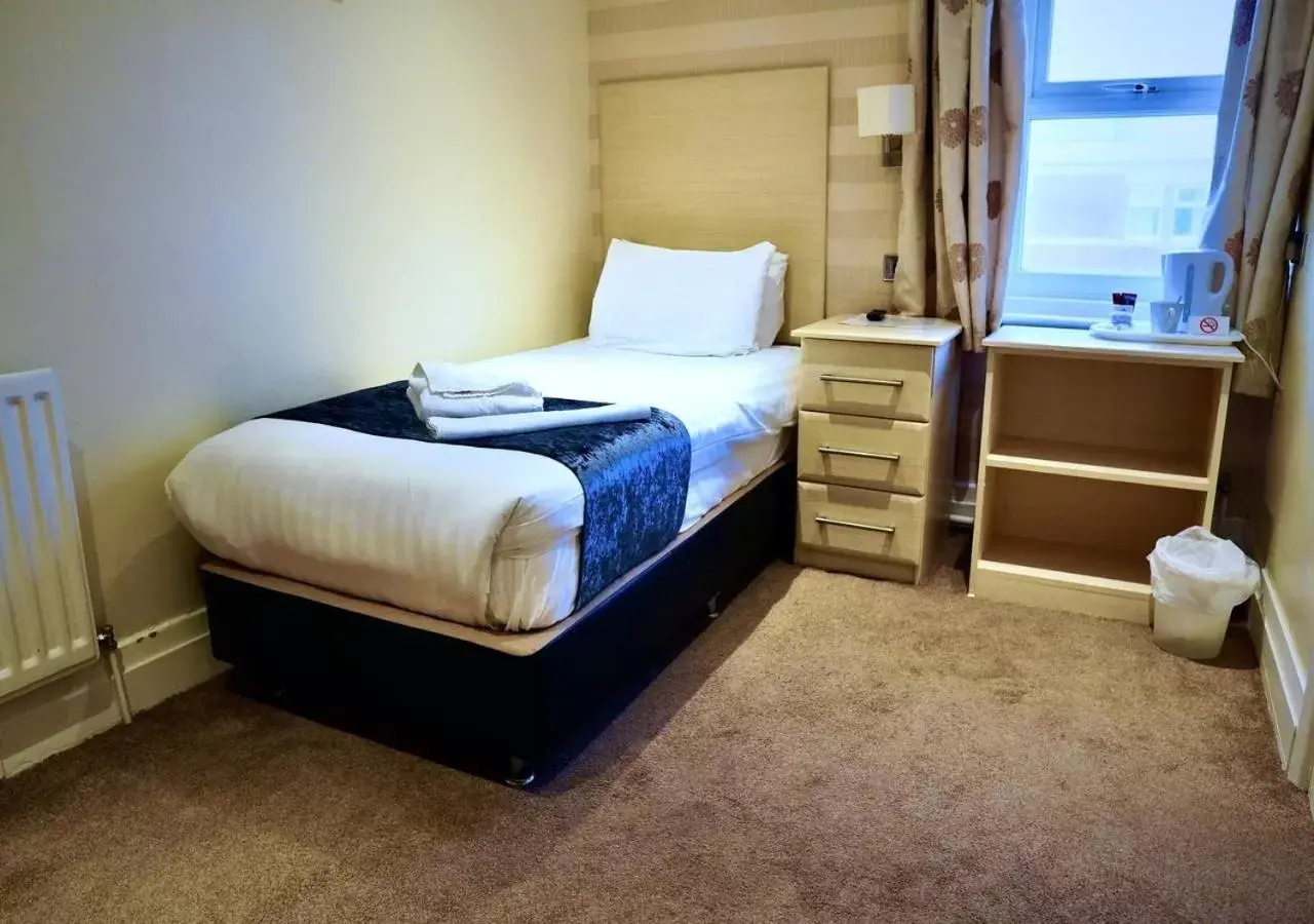 Bed in The Royal Boston Hotel by Compass Hospitality Bed in The Royal Boston Hotel by Compass Hospitality