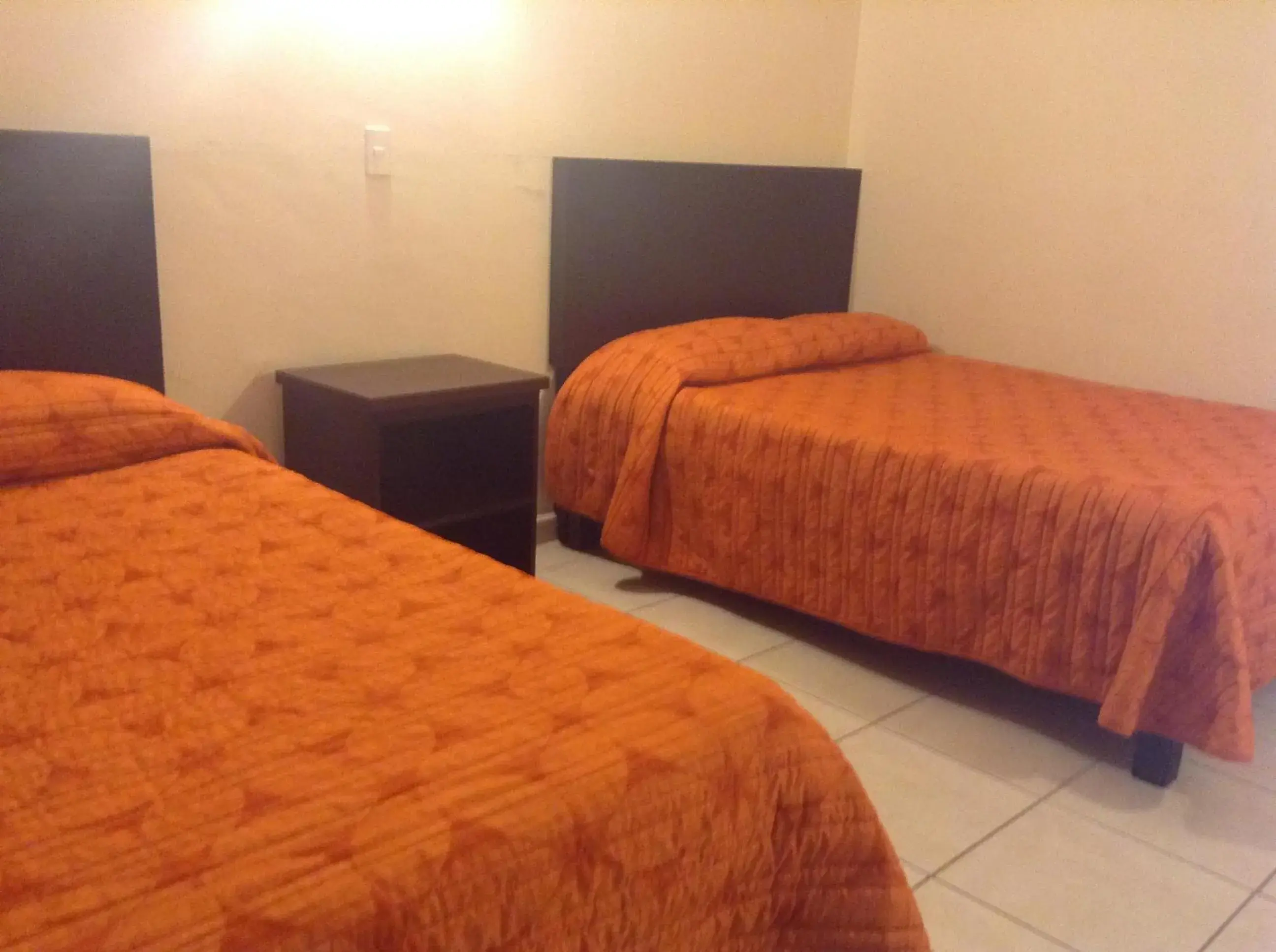 Photo of the whole room, Bed in Los Jitos Hotel & Suites