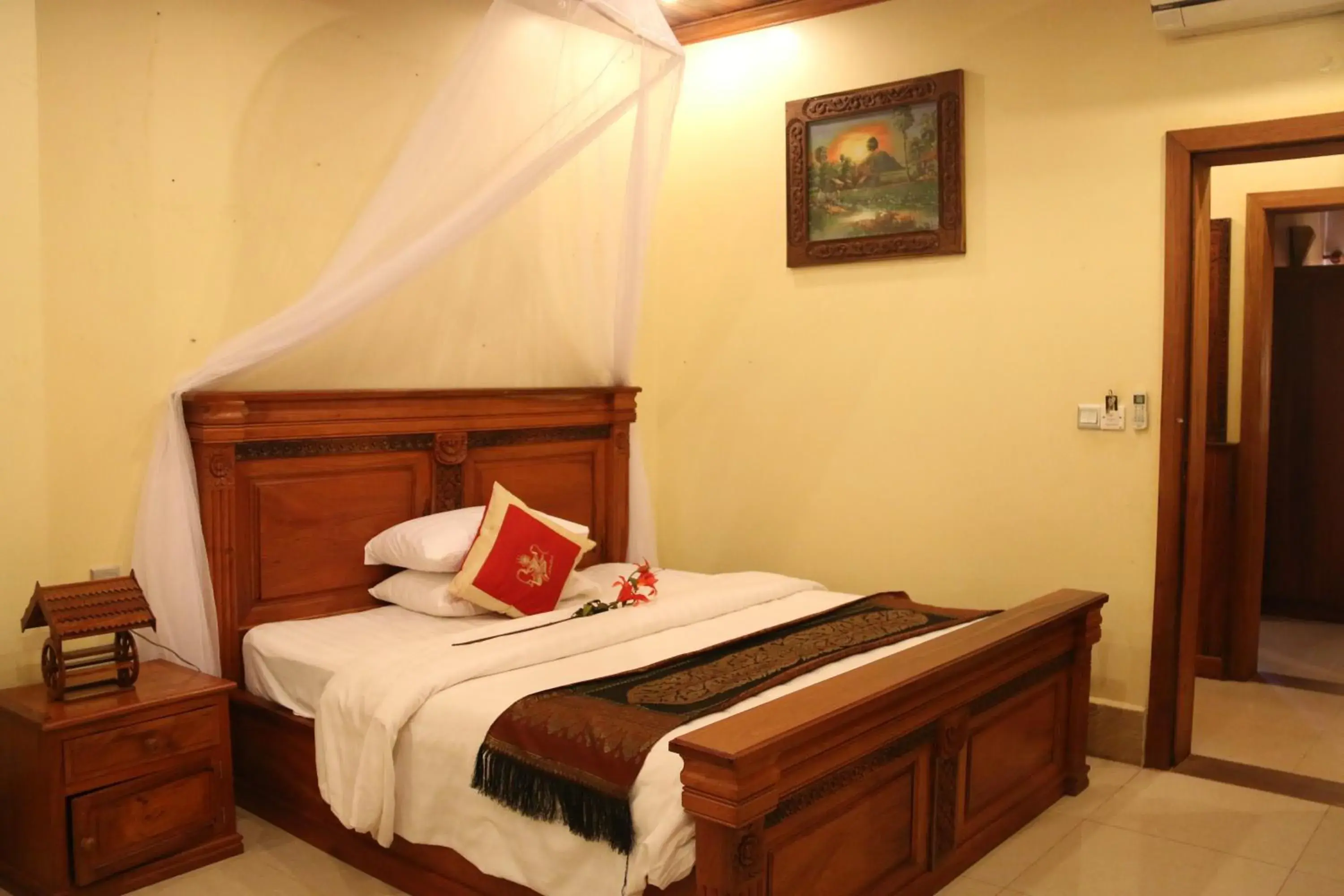 Bed in Shining Angkor Boutique Hotel