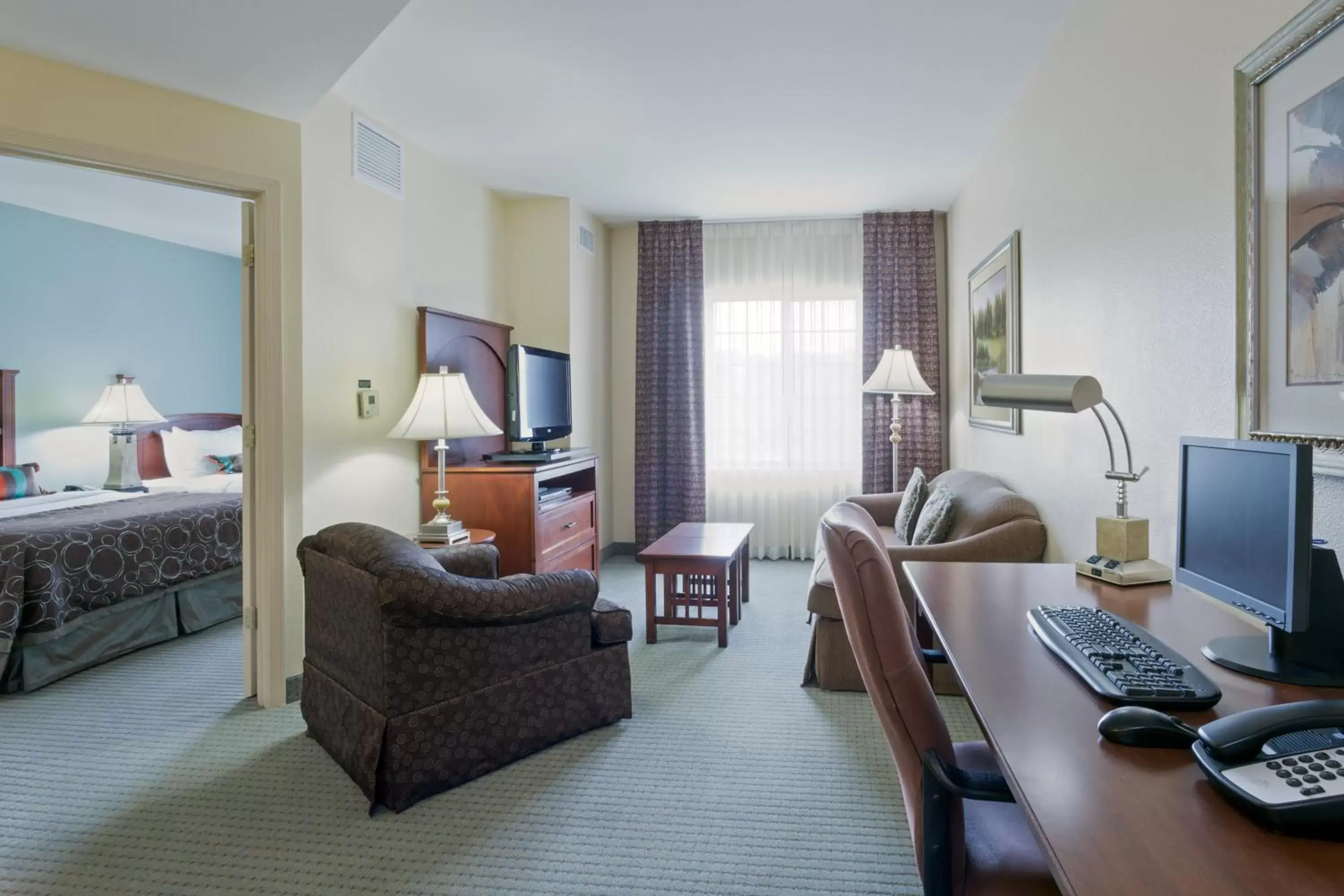 Photo of the whole room, Seating Area in Staybridge Suites Tallahassee I-10 East, an IHG Hotel