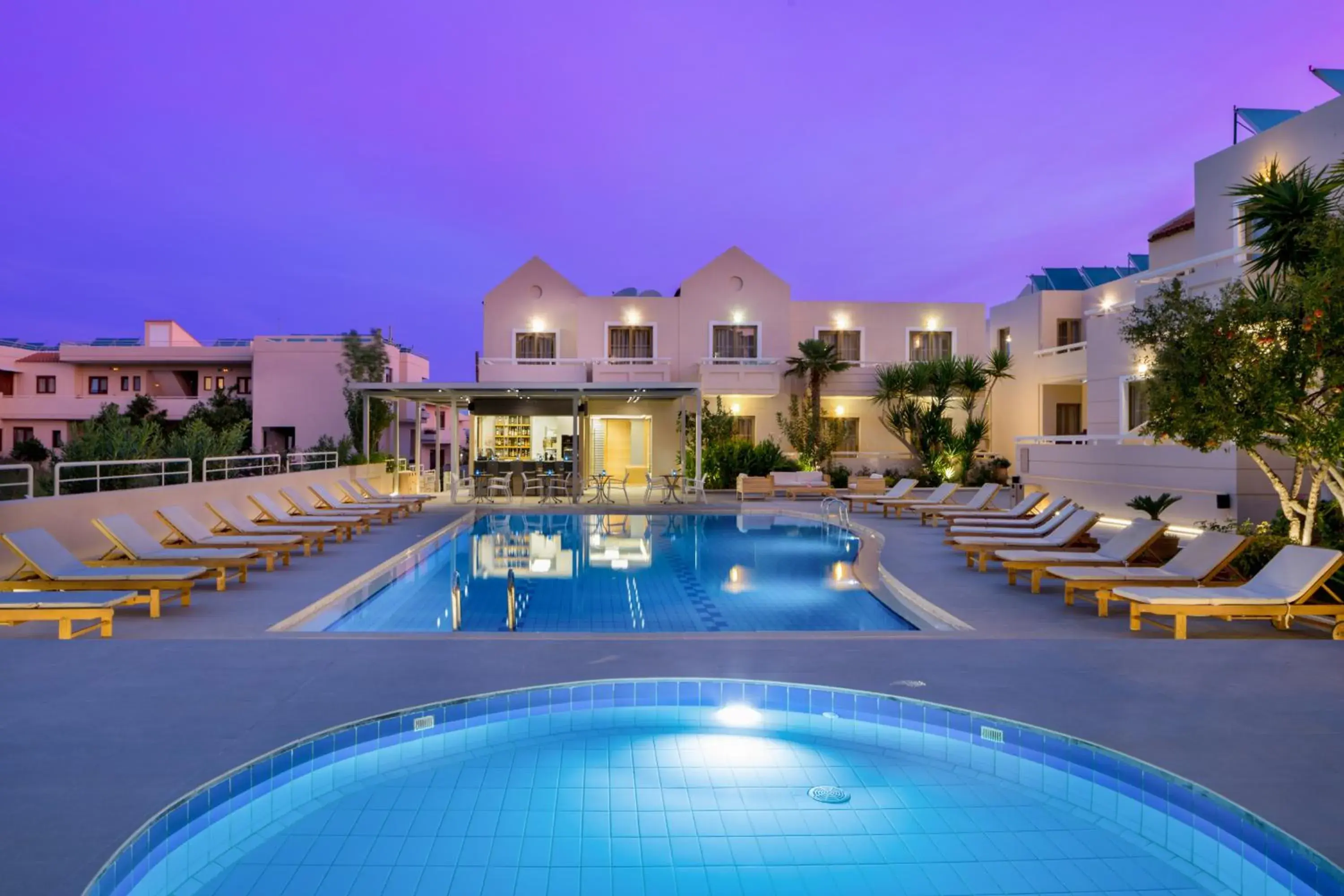 Property building, Swimming Pool in Oscar Suites & Village