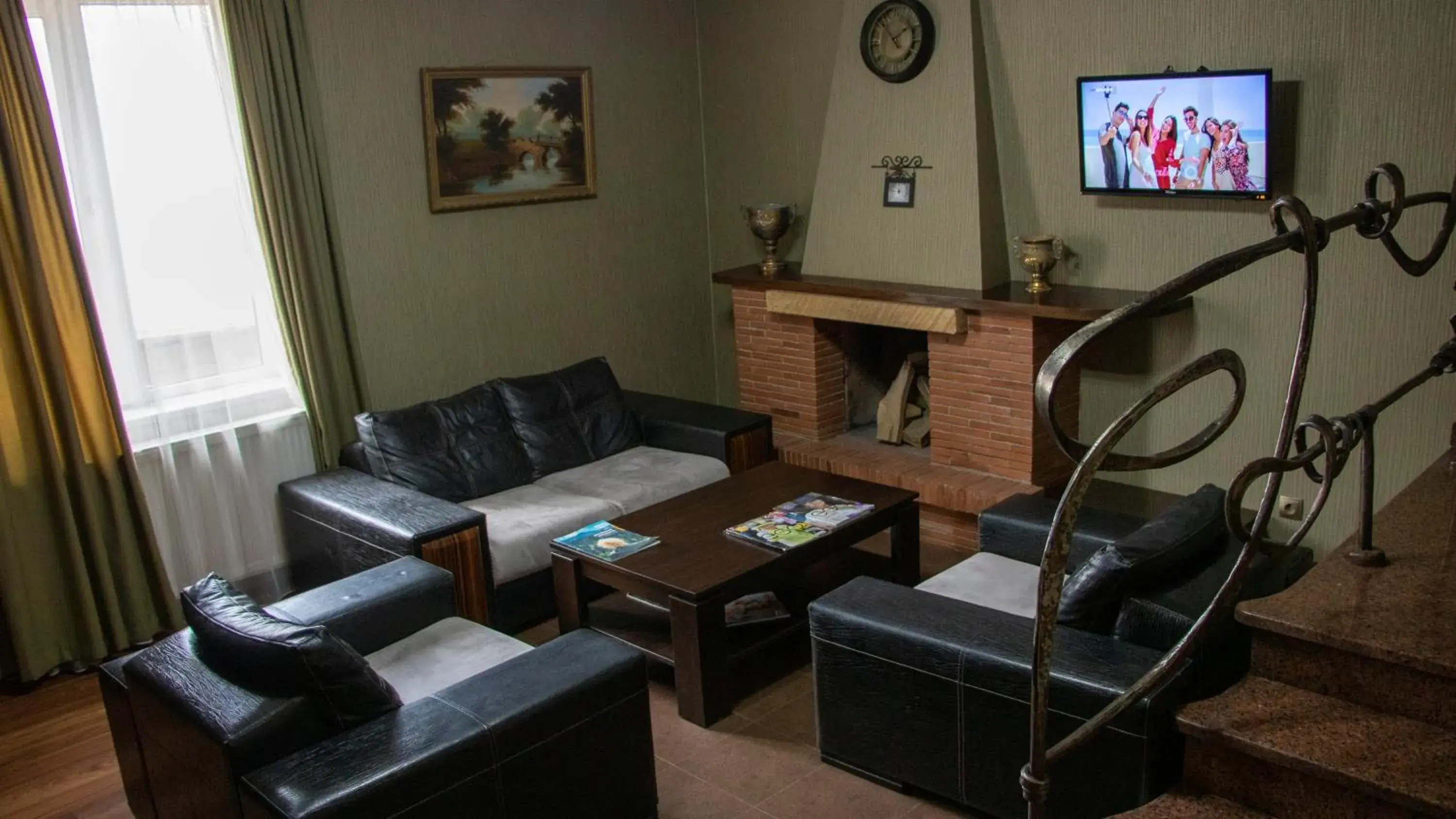 Communal lounge/ TV room, Seating Area in Hotel New Metekhi