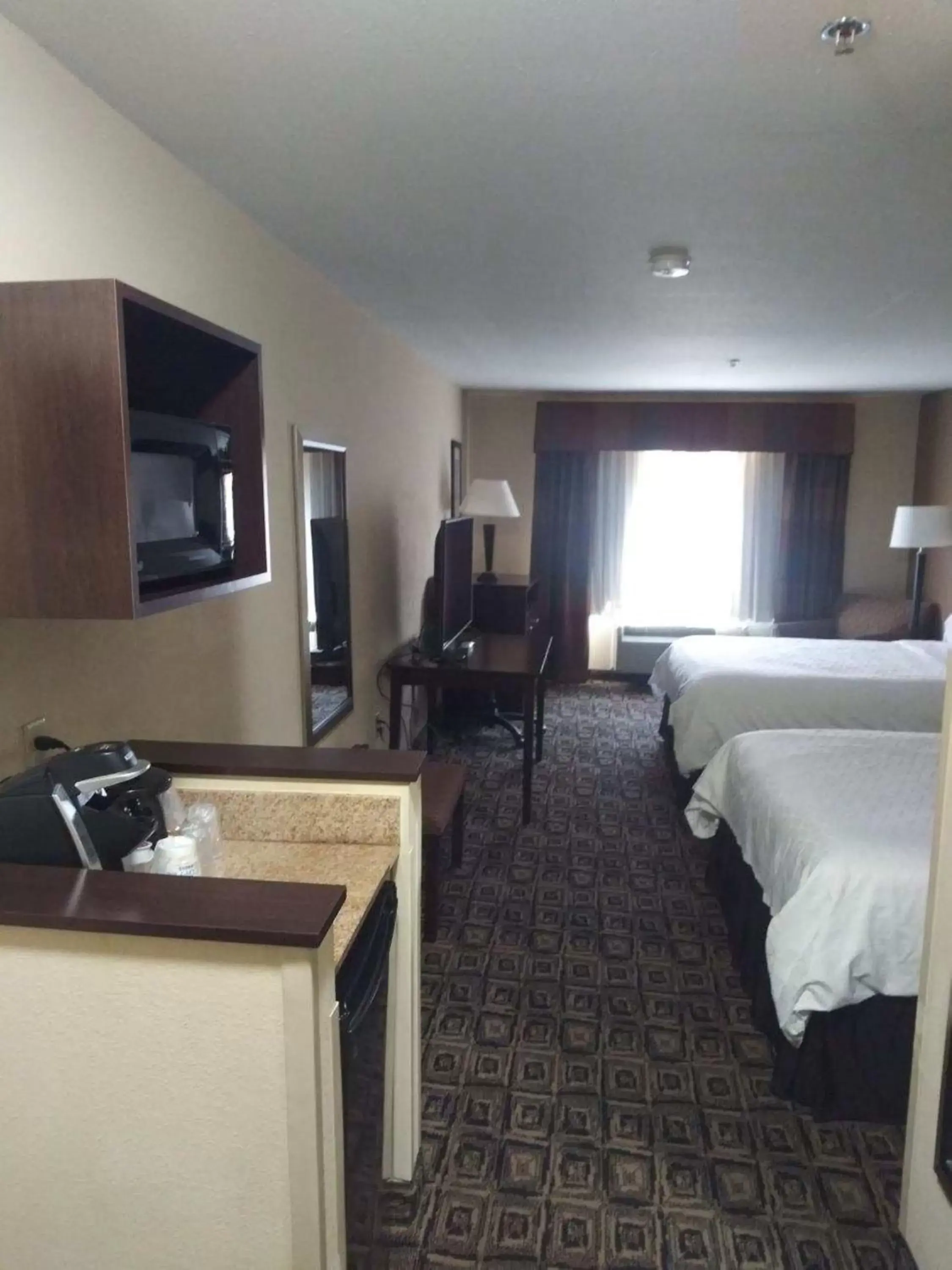 Photo of the whole room, TV/Entertainment Center in Holiday Inn Express & Suites Zanesville North, an IHG Hotel