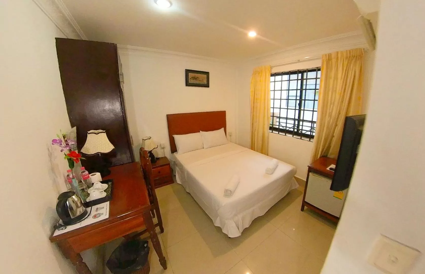 Bed in Riverside Hotel Phnom Penh