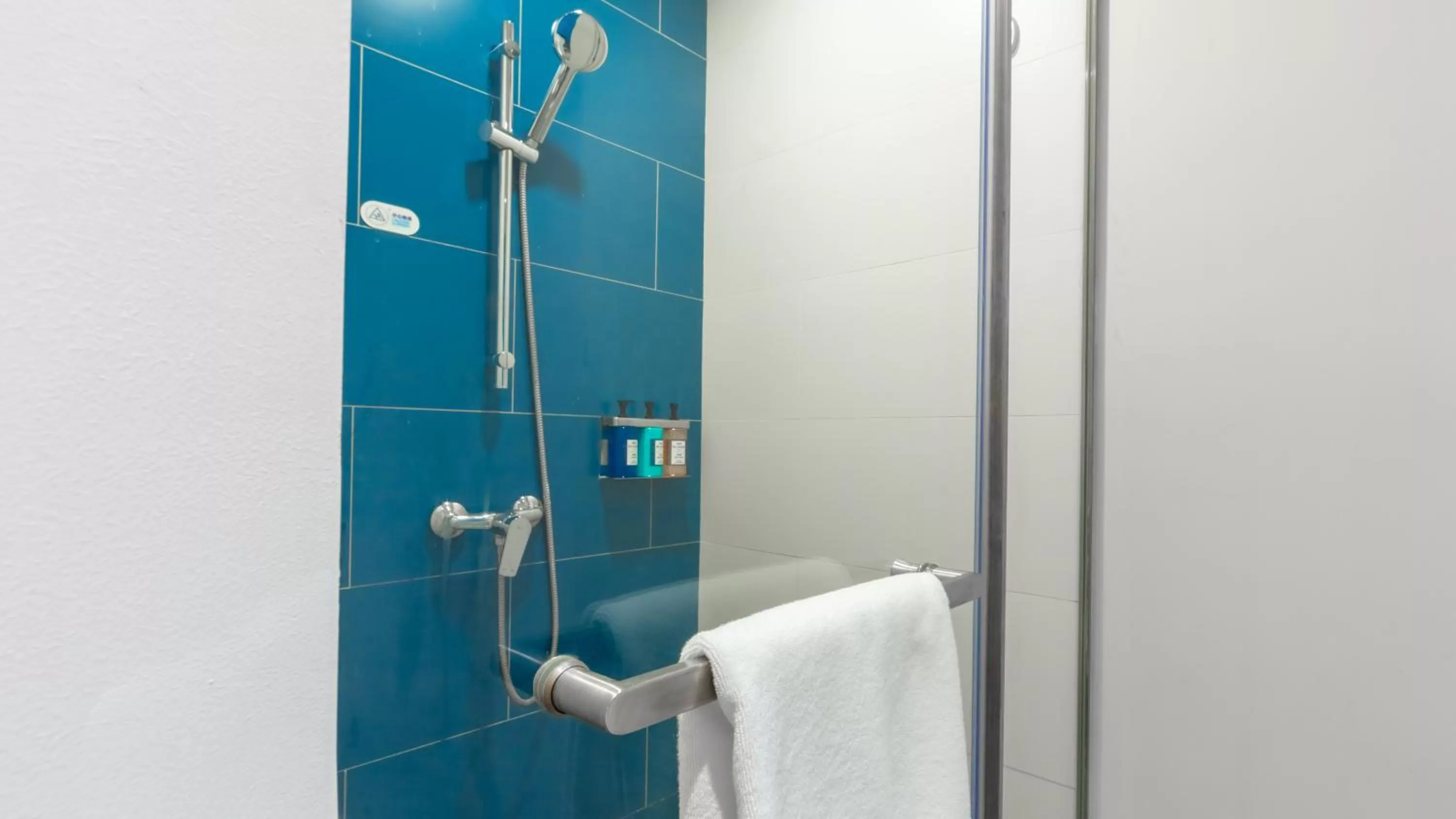 Shower in Holiday Inn Express Shanghai Pudong Airport by IHG