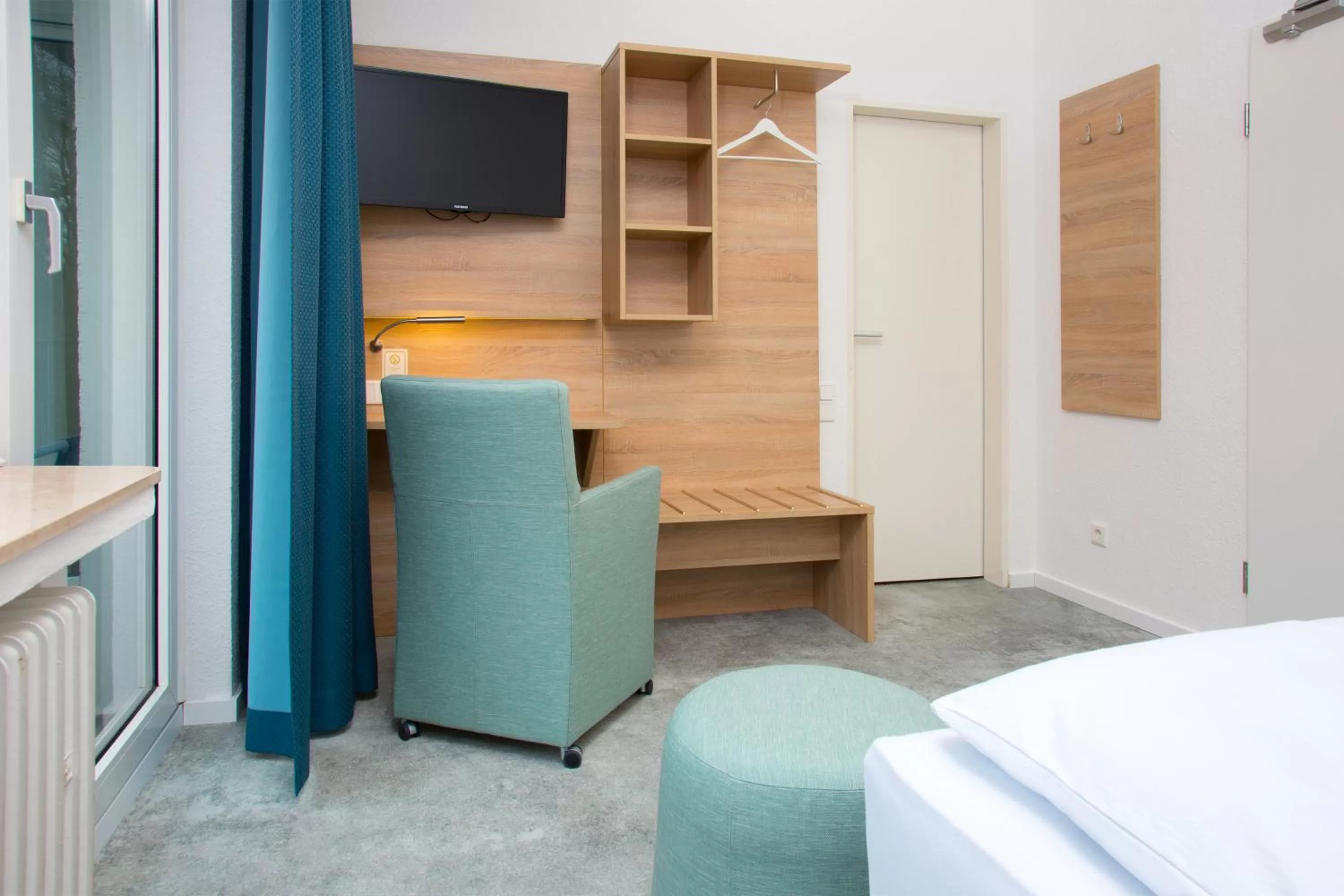 Photo of the whole room, Bed in Parkhotel Lippstadt