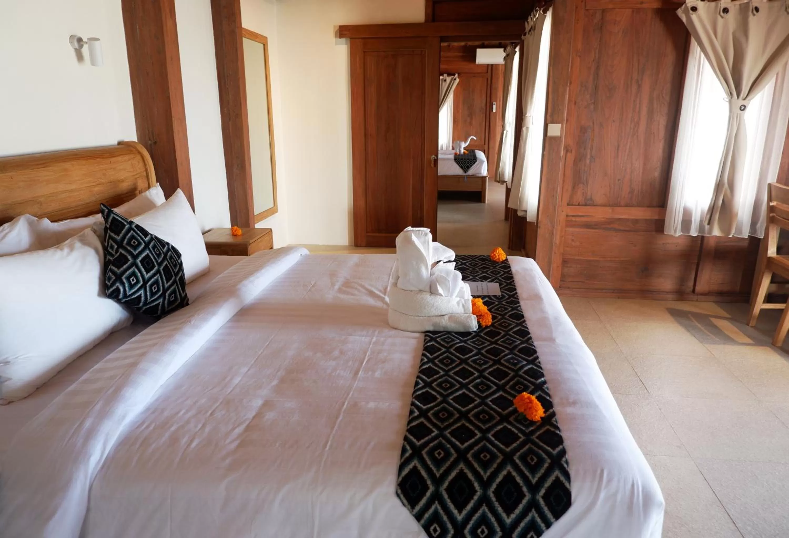 Property building, Bed in Blue Harbor Beachfront Villas & Resto