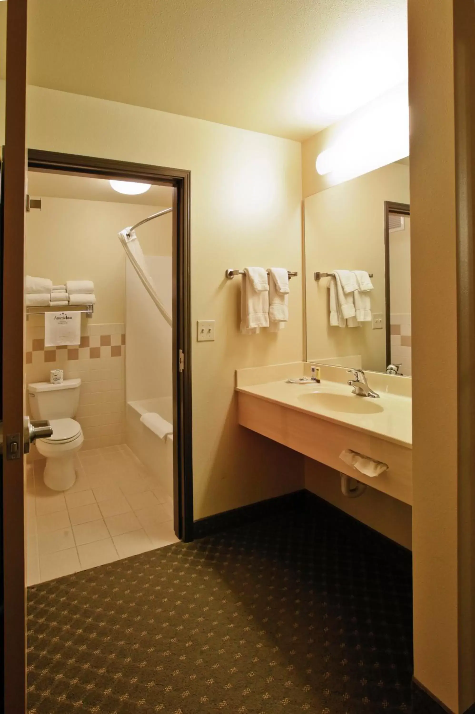 Bathroom in AmericInn by Wyndham Havre