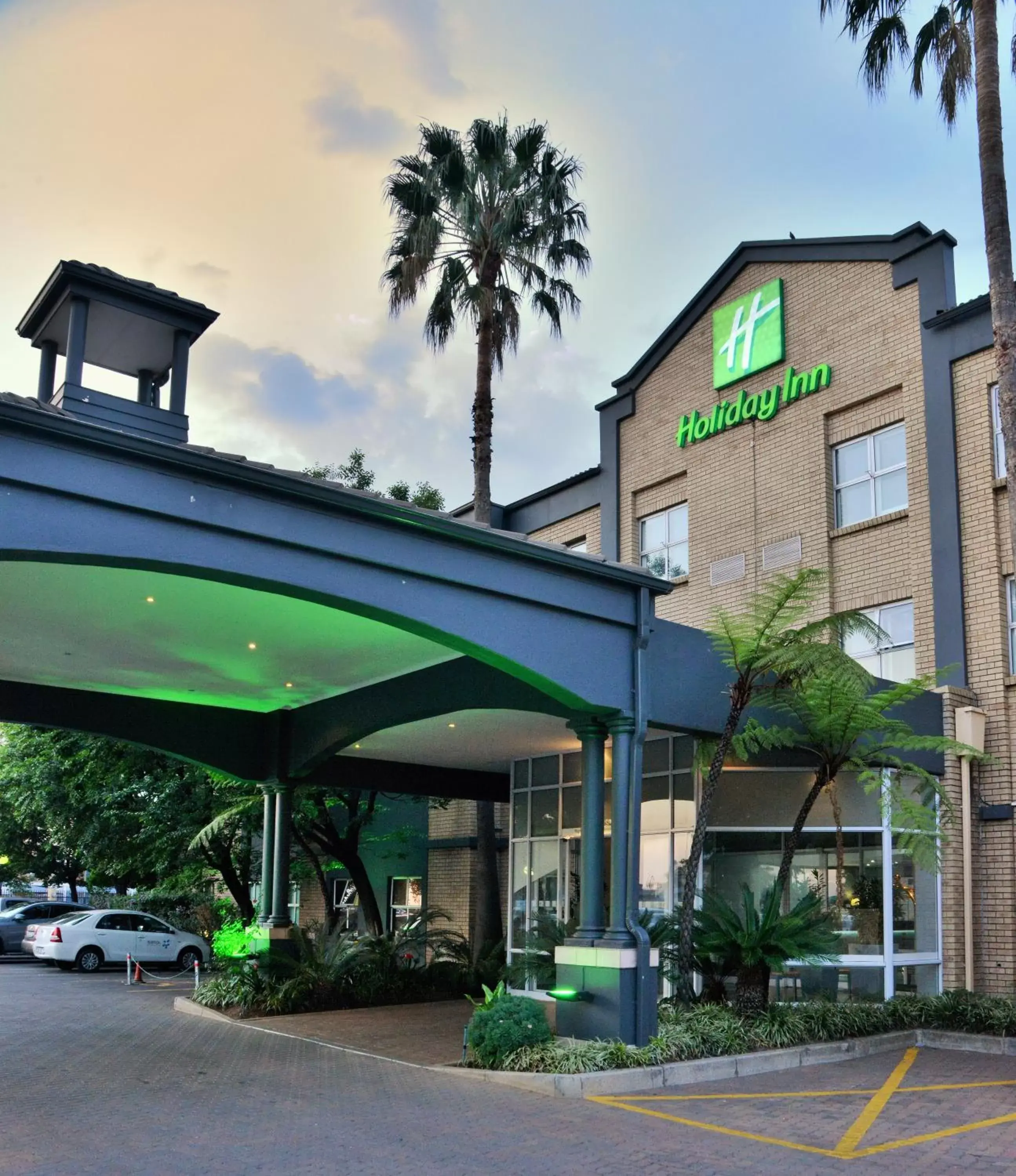 Property building in Holiday Inn Johannesburg OR Tambo Airport Hotel by IHG Property building in Holiday Inn Johannesburg OR Tambo Airport Hotel by IHG