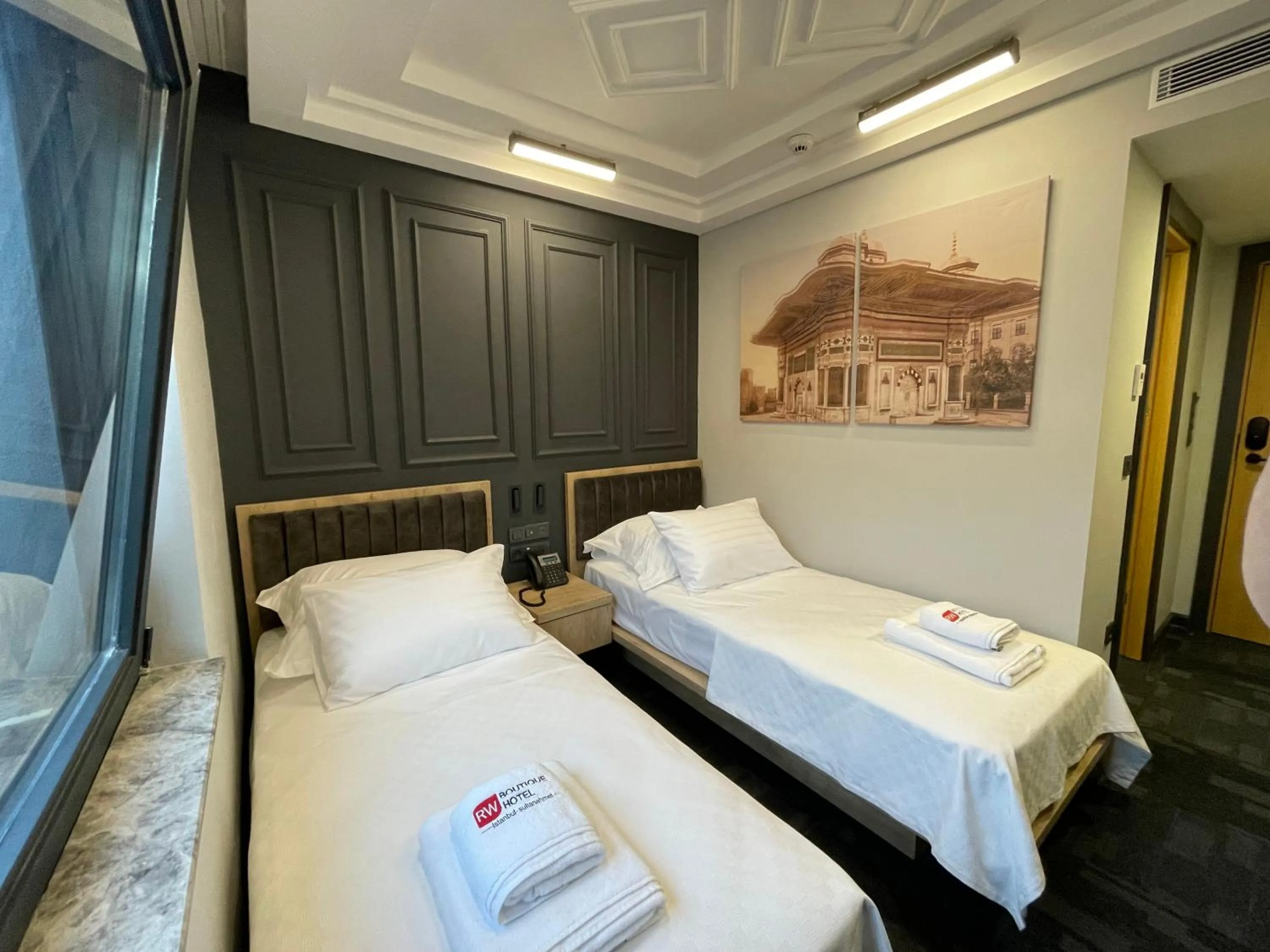 Bed in RW BOUTIQUE HOTEL