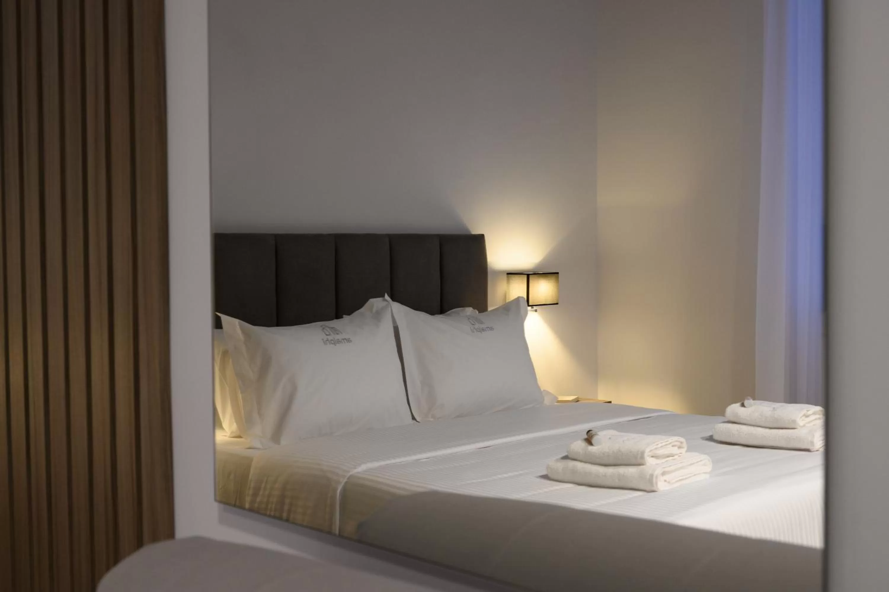 Bed in AMALPHI Corfu City Living