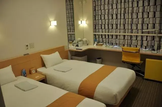 Bed in Smile Hotel Matsuyama