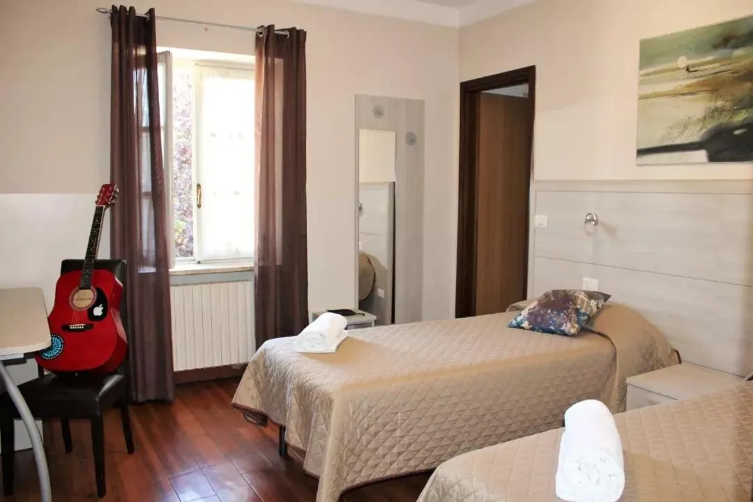 Photo of the whole room, Bed in Nuovo Hotel Giardini