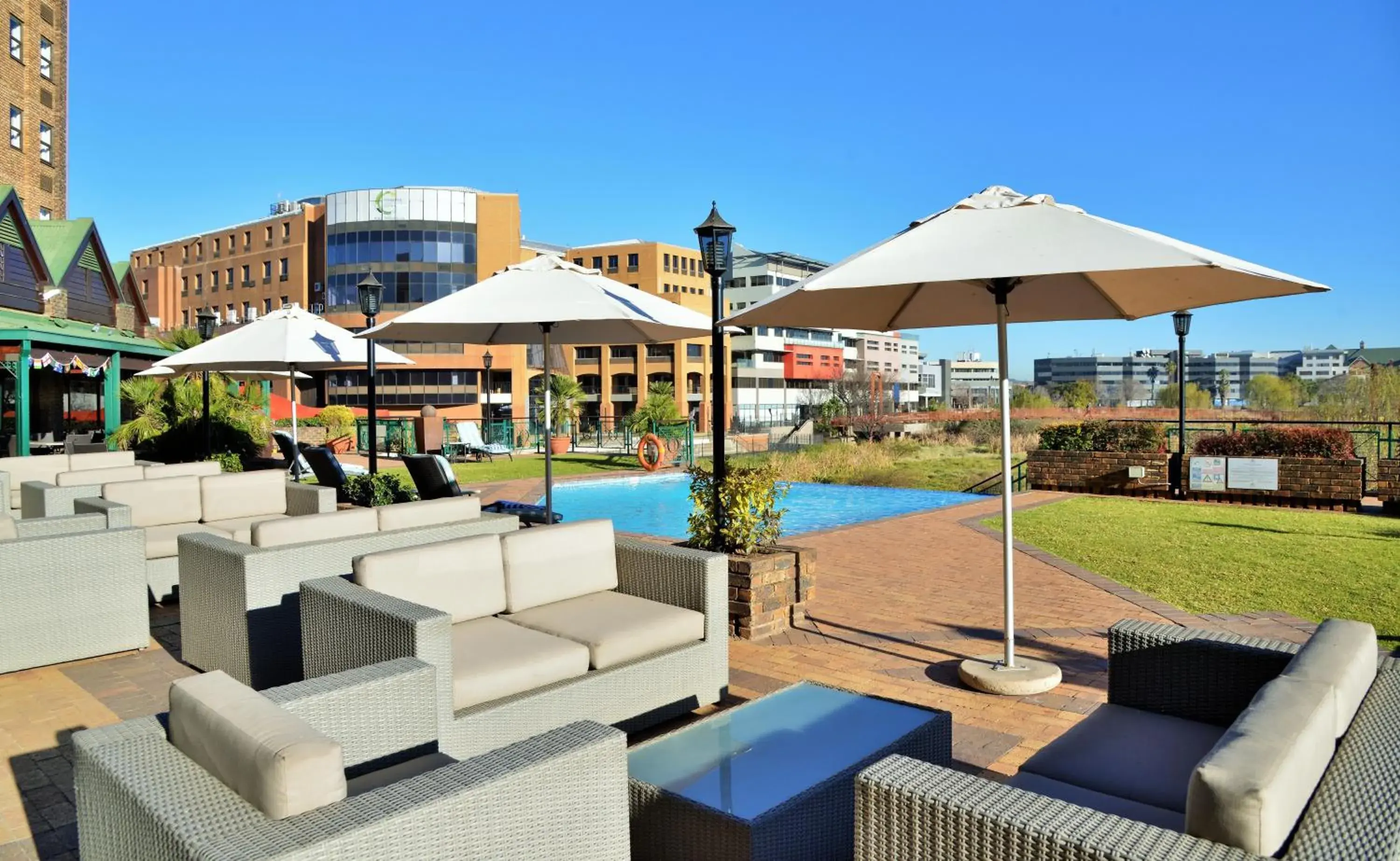Patio, Swimming Pool in The Centurion Hotel