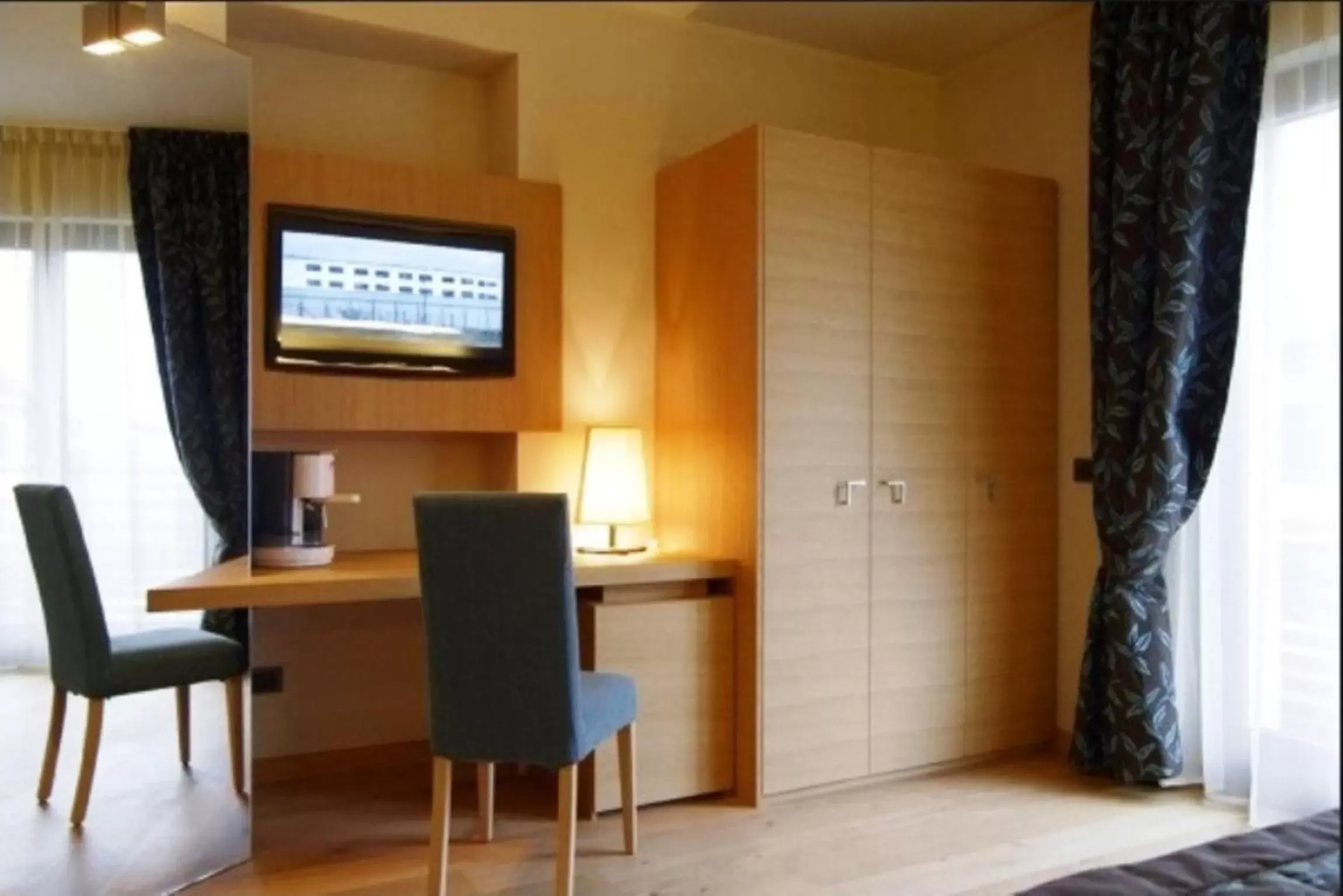 Bedroom, TV/Entertainment Center in Hotel Natura
