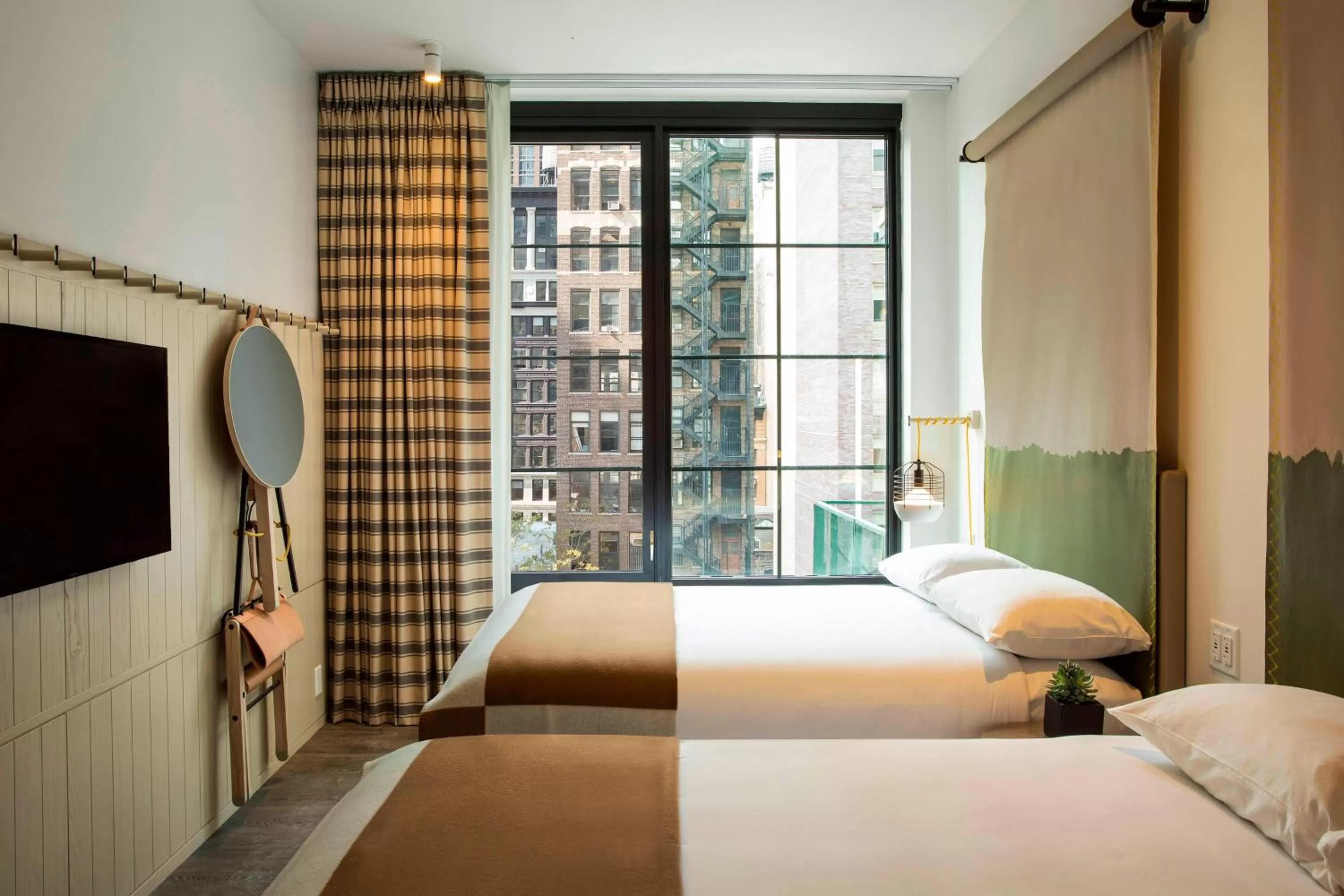 Photo of the whole room, Bed in Moxy NYC Chelsea