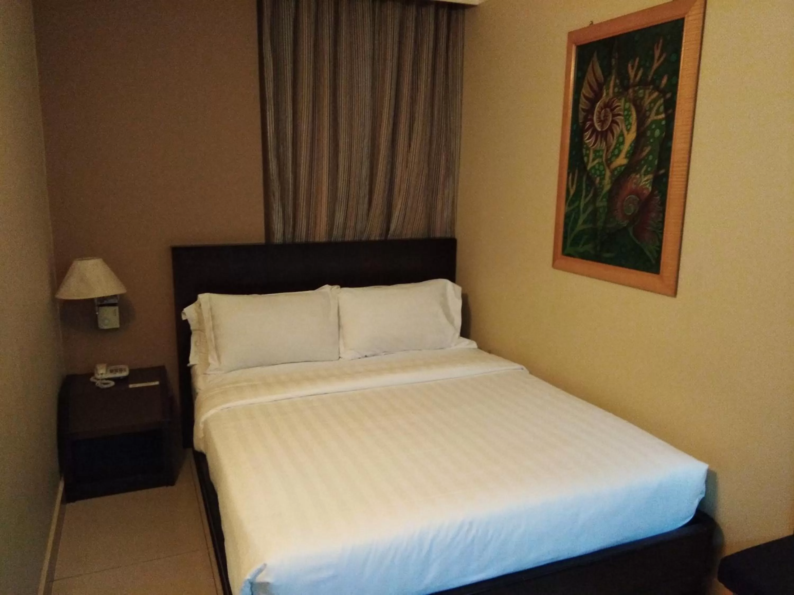 Bed in Kinabalu Daya Hotel