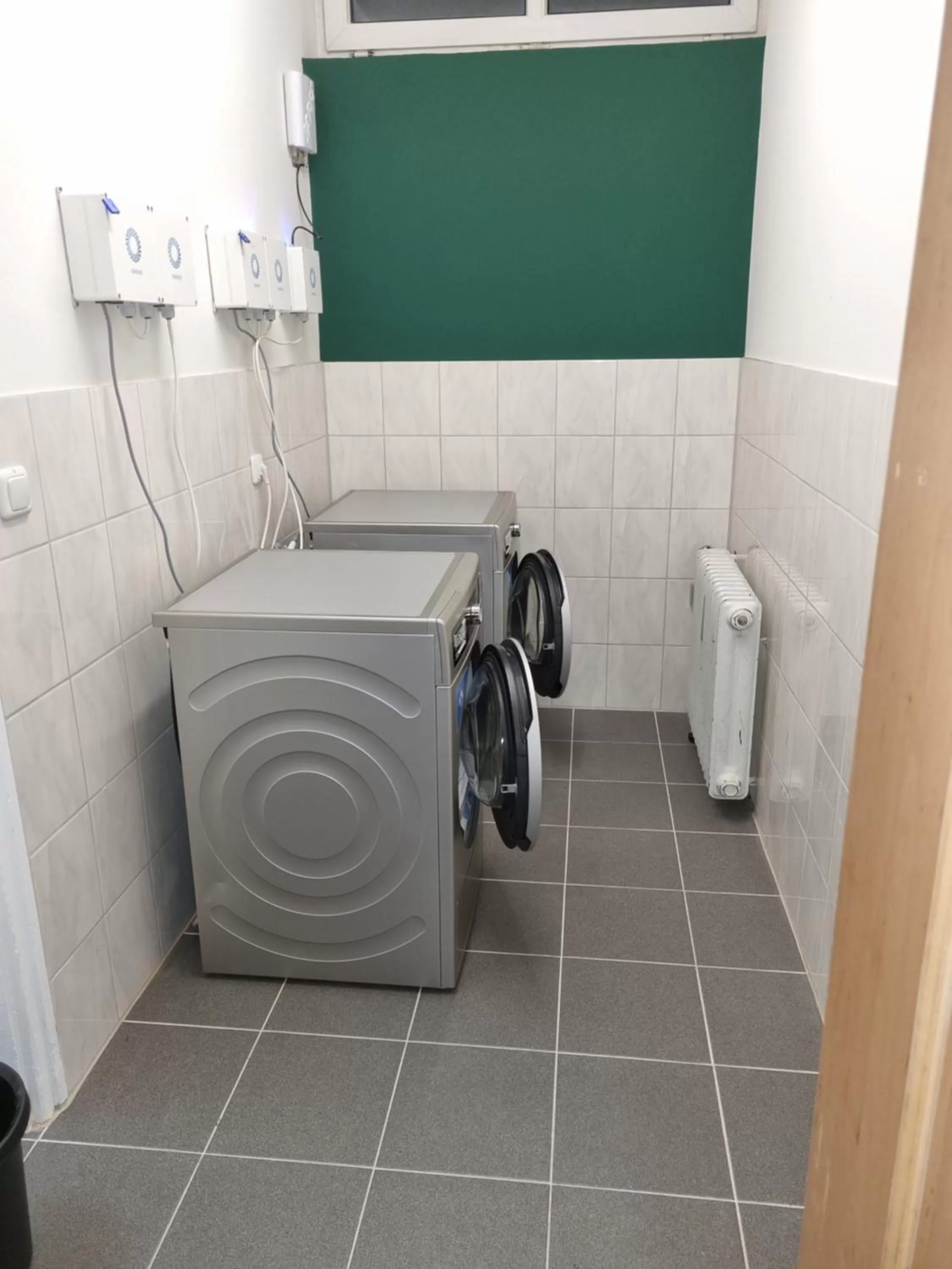 washing machine in myMINGA4 - Hotel & serviced Apartments