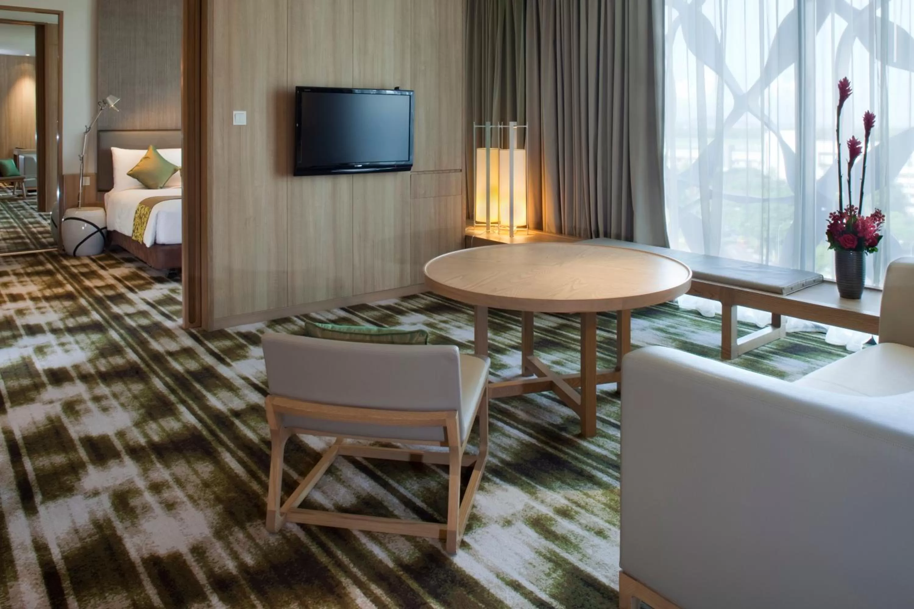 Living room in Crowne Plaza Changi Airport by IHG