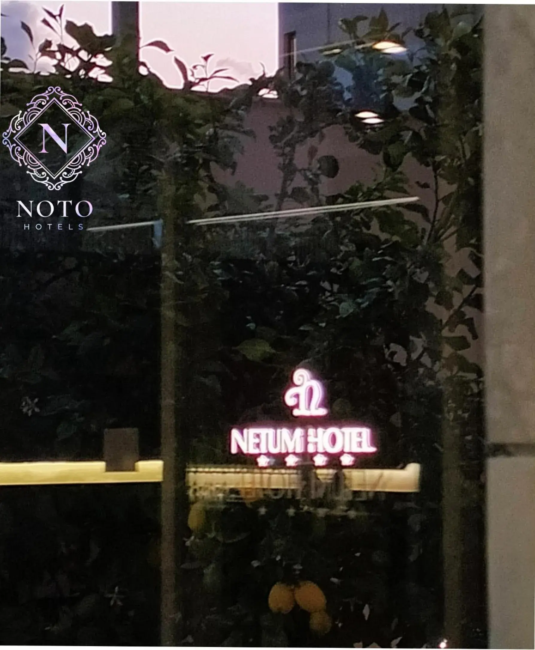 Property building, Property Logo/Sign in Netum Hotel