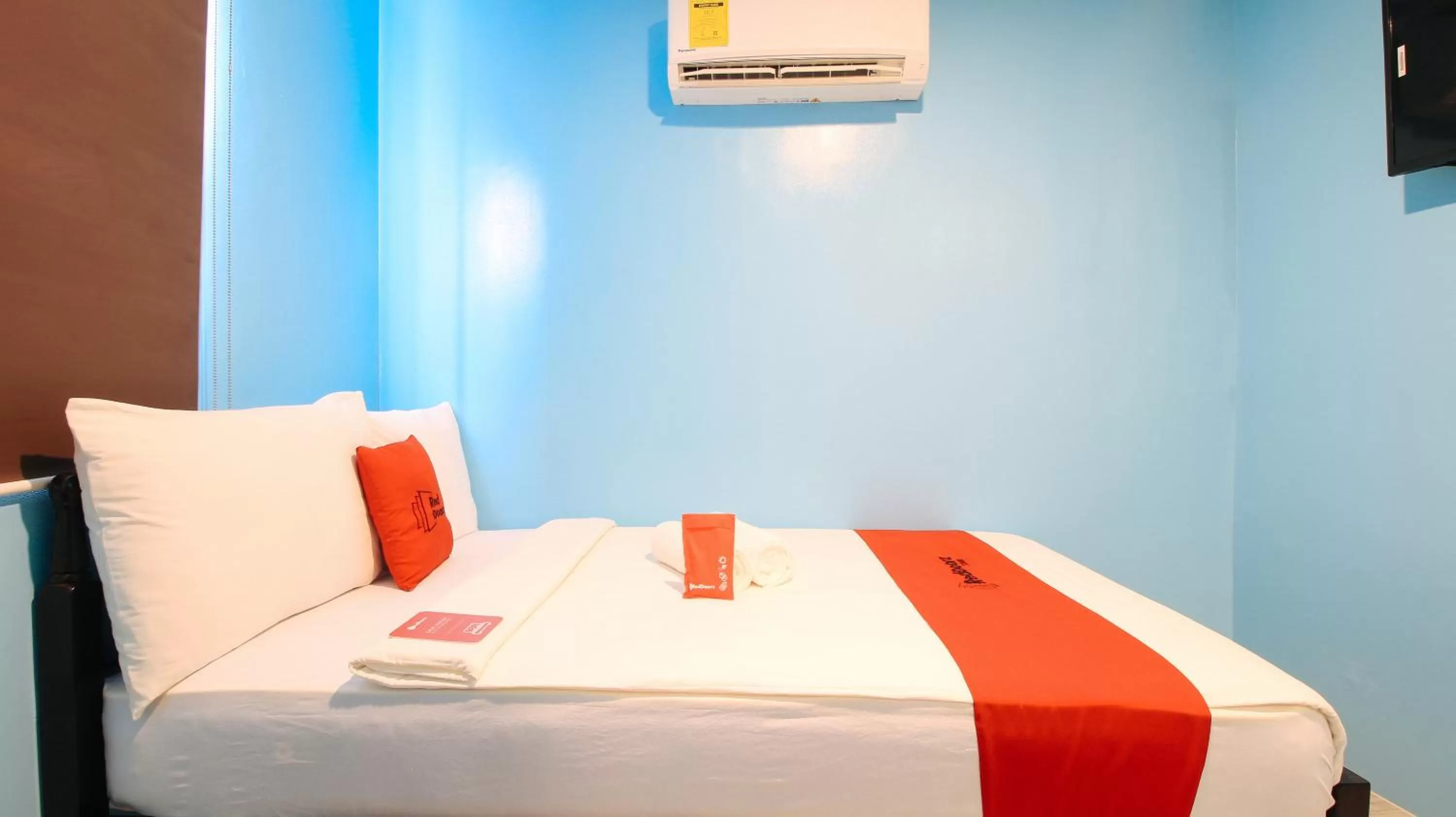 Photo of the whole room, Bed in RedDoorz at Hotel Rosemarie