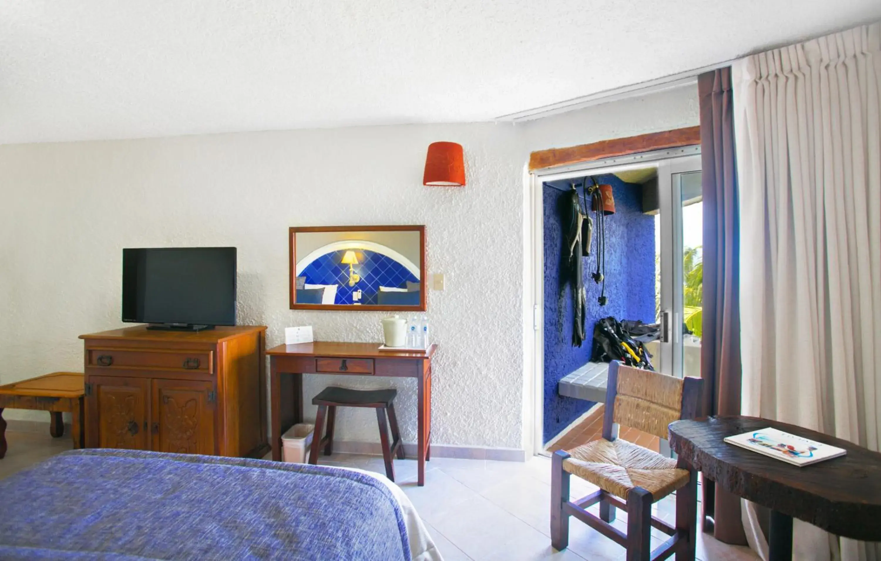 Balcony/Terrace, TV/Entertainment Center in Casa del Mar Cozumel Hotel & Dive Resort