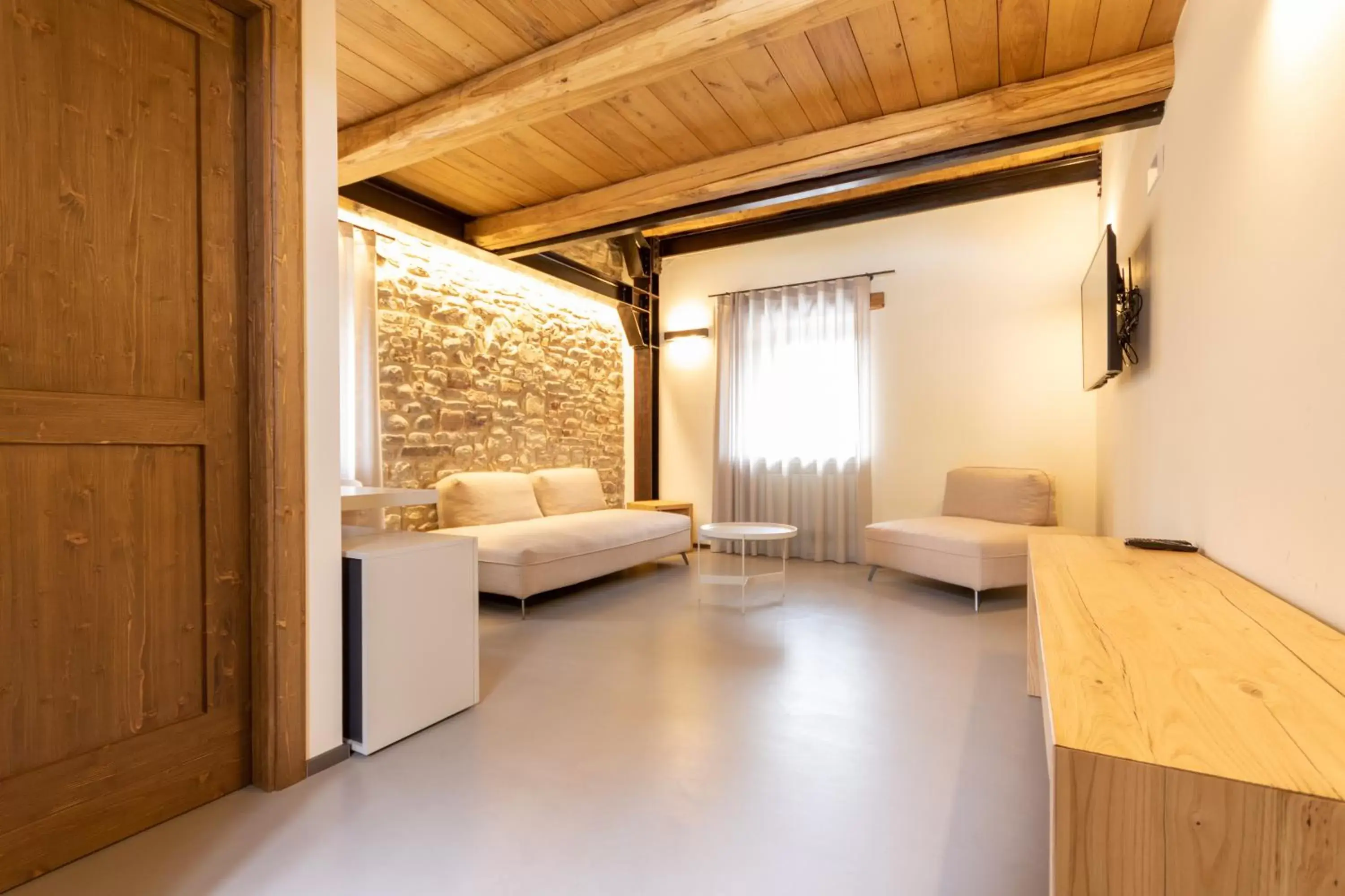 Photo of the whole room, Seating Area in Borgotufi Albergo Diffuso