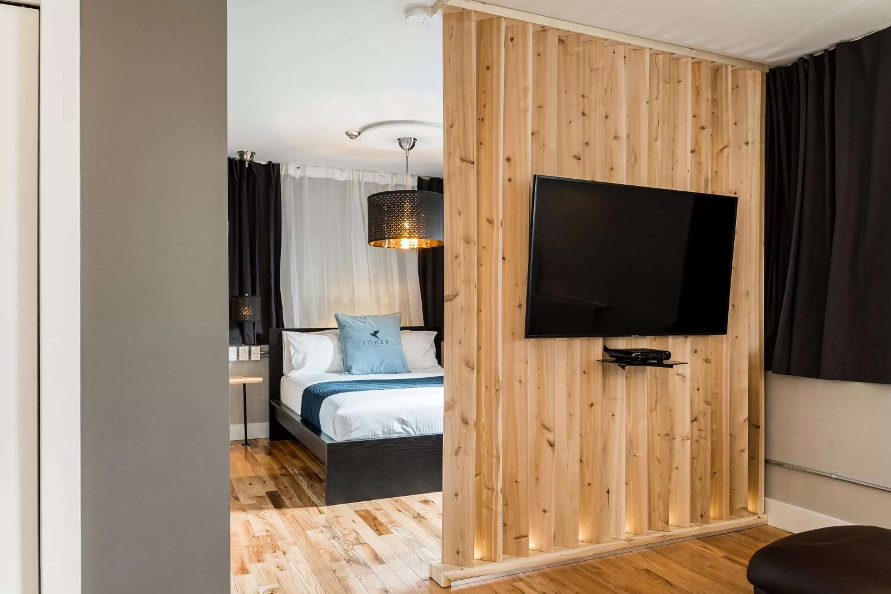 Bed in Capitol Robinson by Bower Hotels & Suites