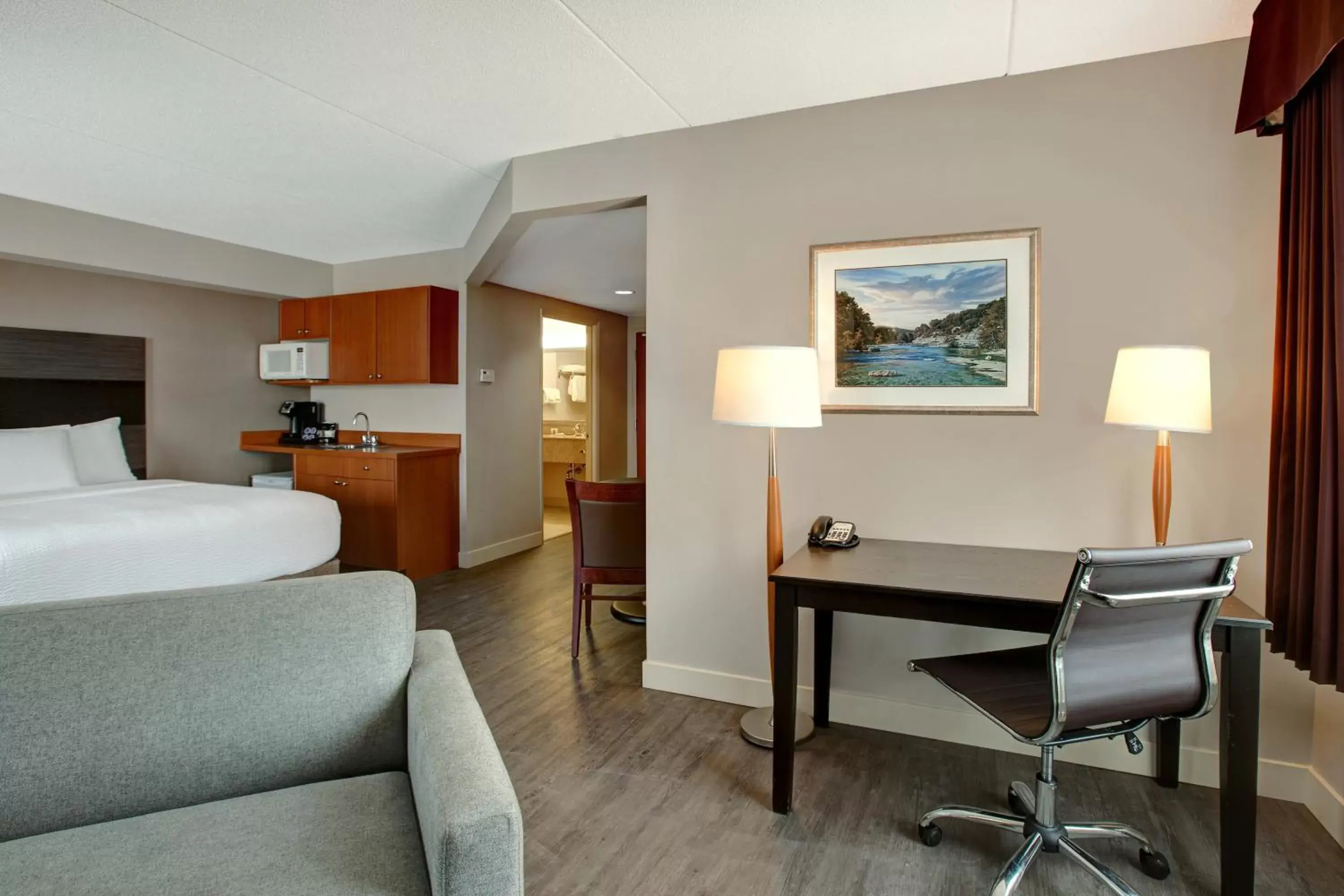 Bedroom, Seating Area in Days Inn & Suites by Wyndham Collingwood
