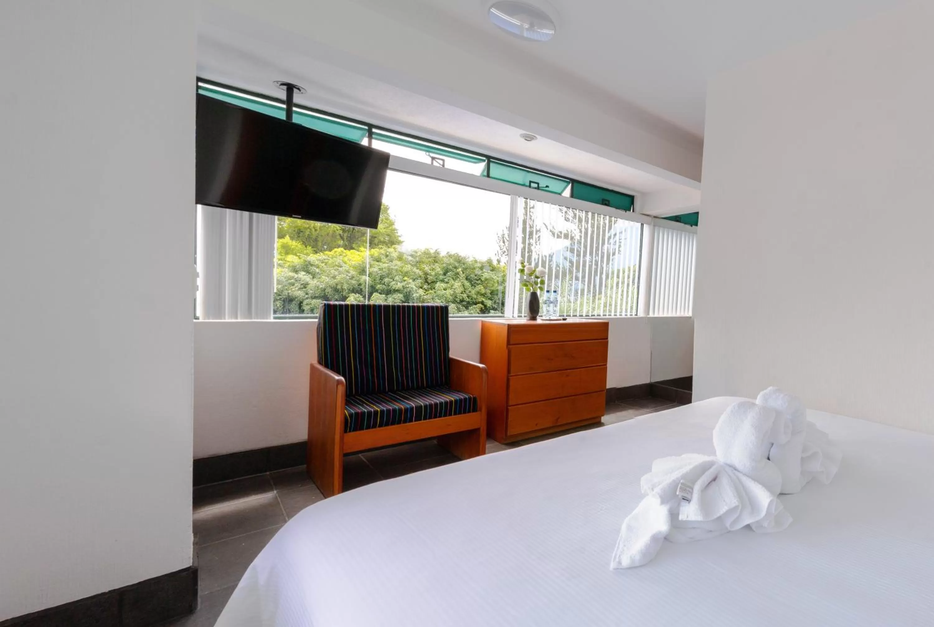 Bed in El Dragon Hotel