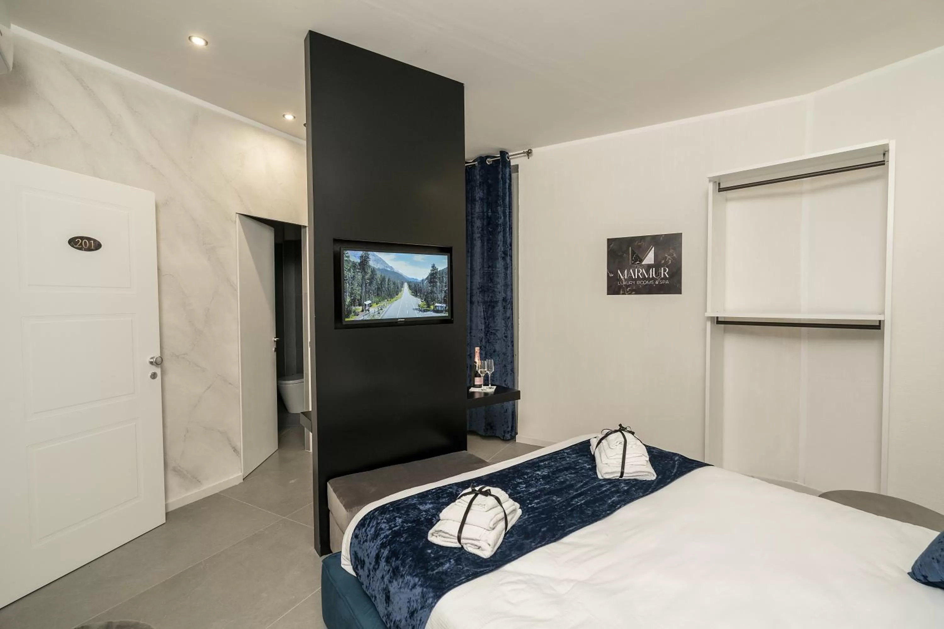 TV/Entertainment Center in Marmur Suite