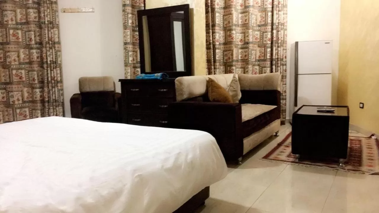 Bed in Al Tawheed Hotel Apartments