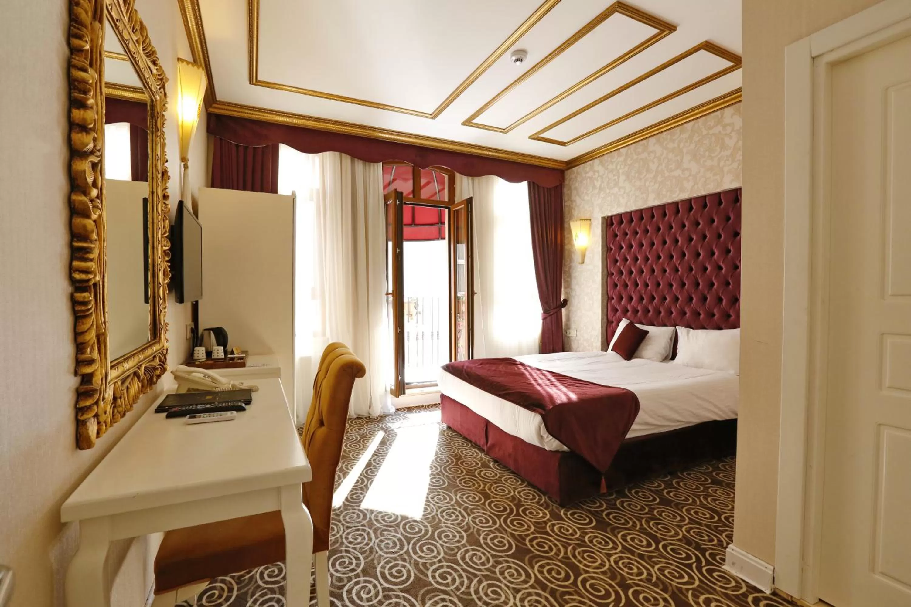 Bed in Diamond Royal Hotel