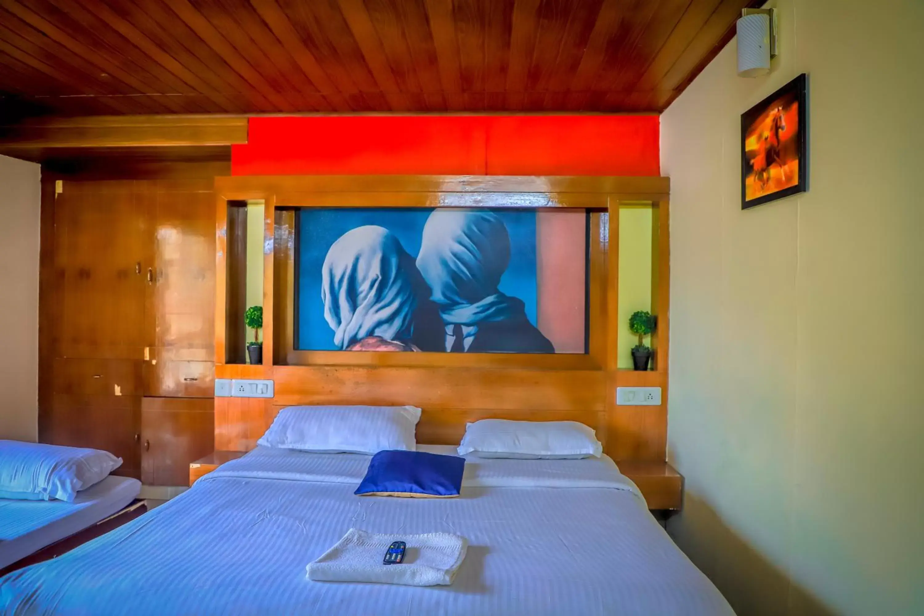 Deluxe Triple Room in Munnar Days Deluxe Triple Room in Munnar Days