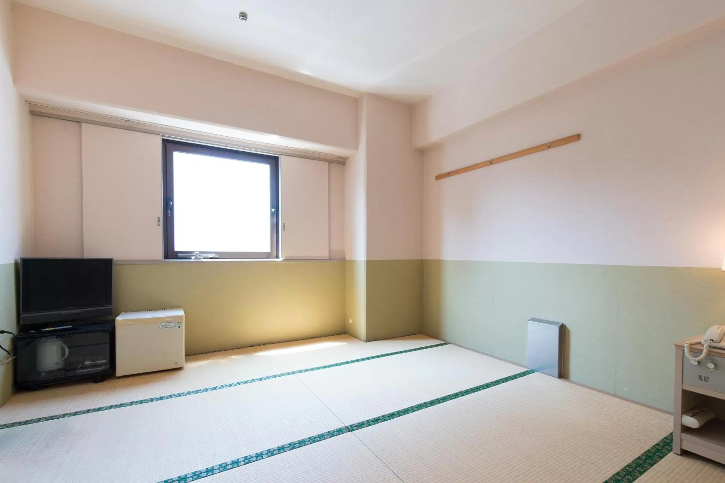 Photo of the whole room, Bed in Tabist Hotel Tetora Kitakyushu