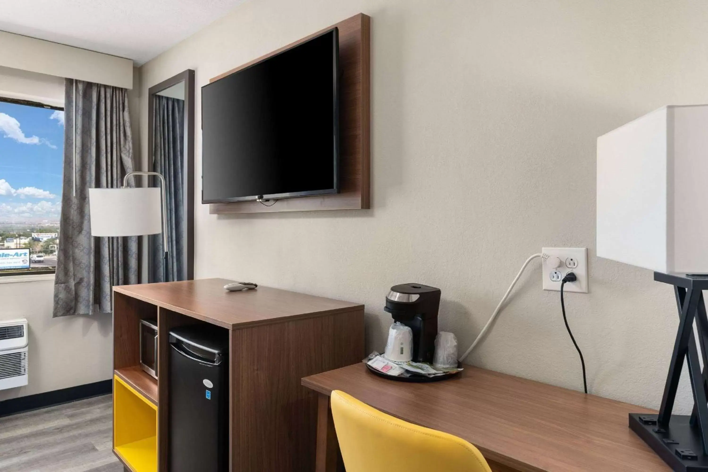 Photo of the whole room, TV/Entertainment Center in Days Inn by Wyndham Albuquerque I-25