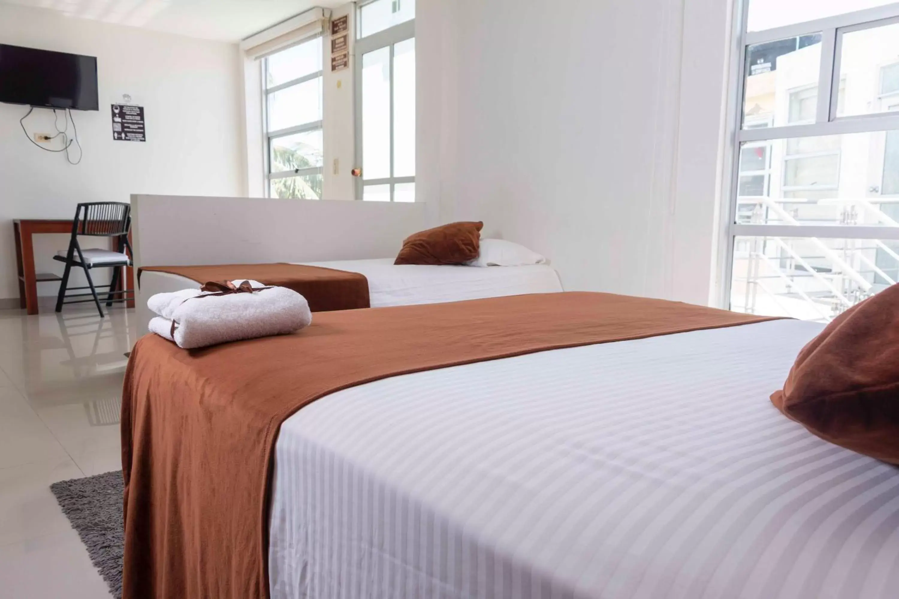 Triple Room in Zuruma Hotel Triple Room in Zuruma Hotel