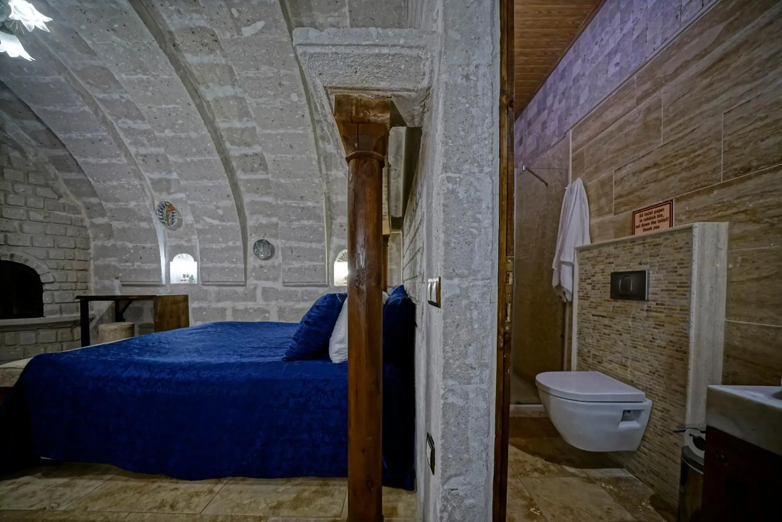 Toilet, Bathroom in Holiday Cave Hotel