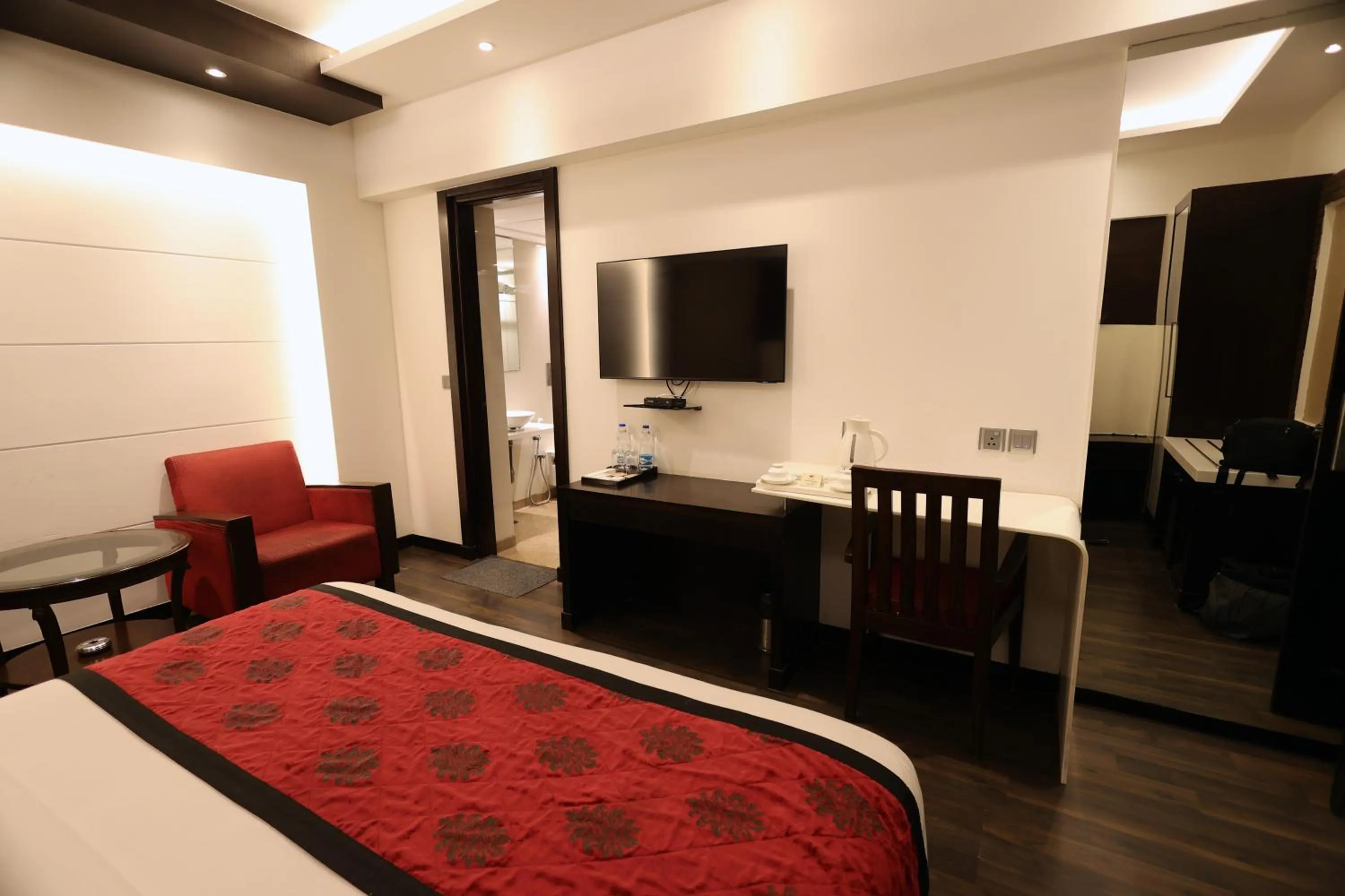 Photo of the whole room, Bed in Hotel Grand Godwin - Near New Delhi Railway Station - Paharganj