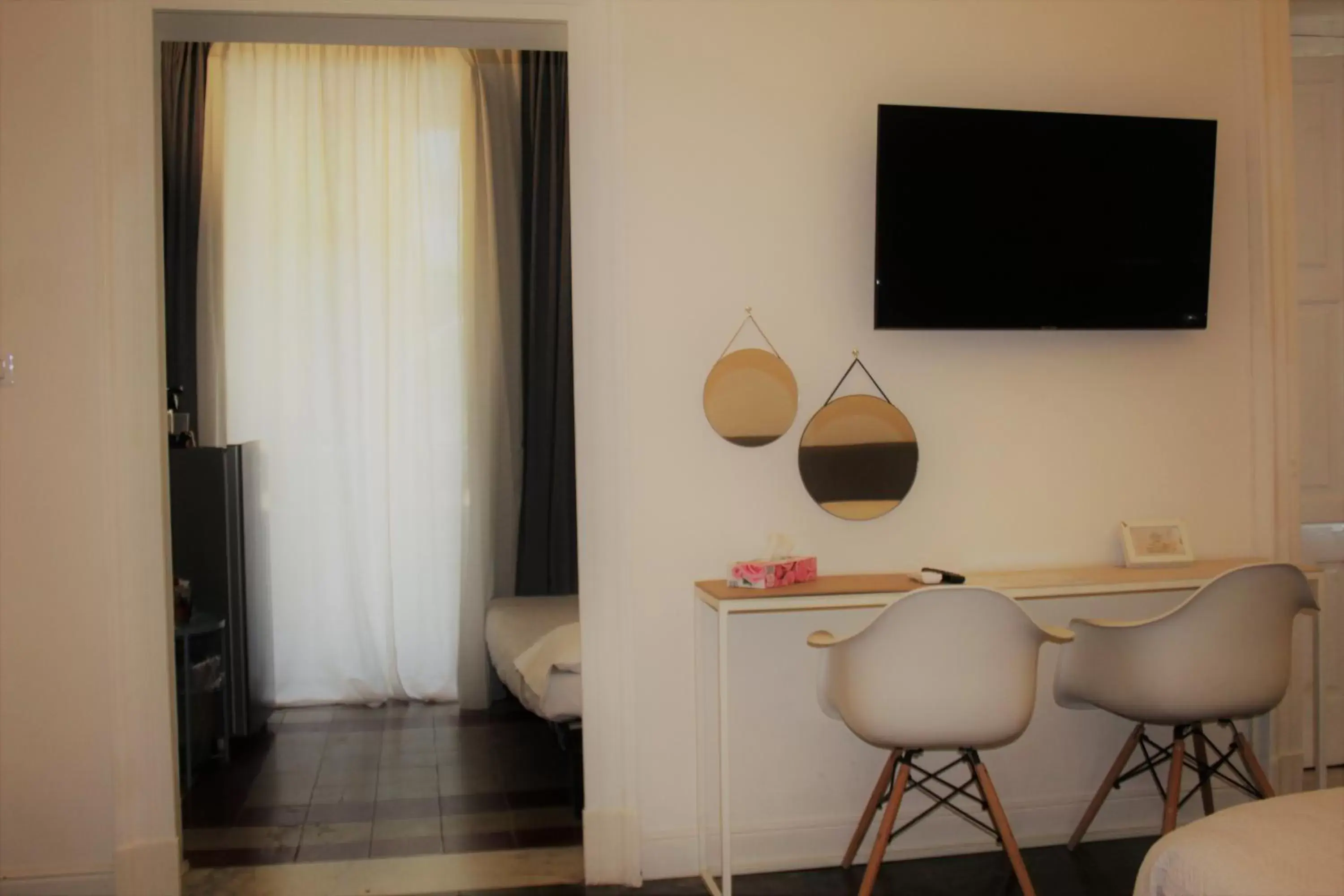 Bed, TV/Entertainment Center in Palazzo del Verga